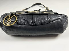 Eine schwarze Saharienne-Tasche aus Leder von Yves Saint Laurent Rive Gauche, um 1980
