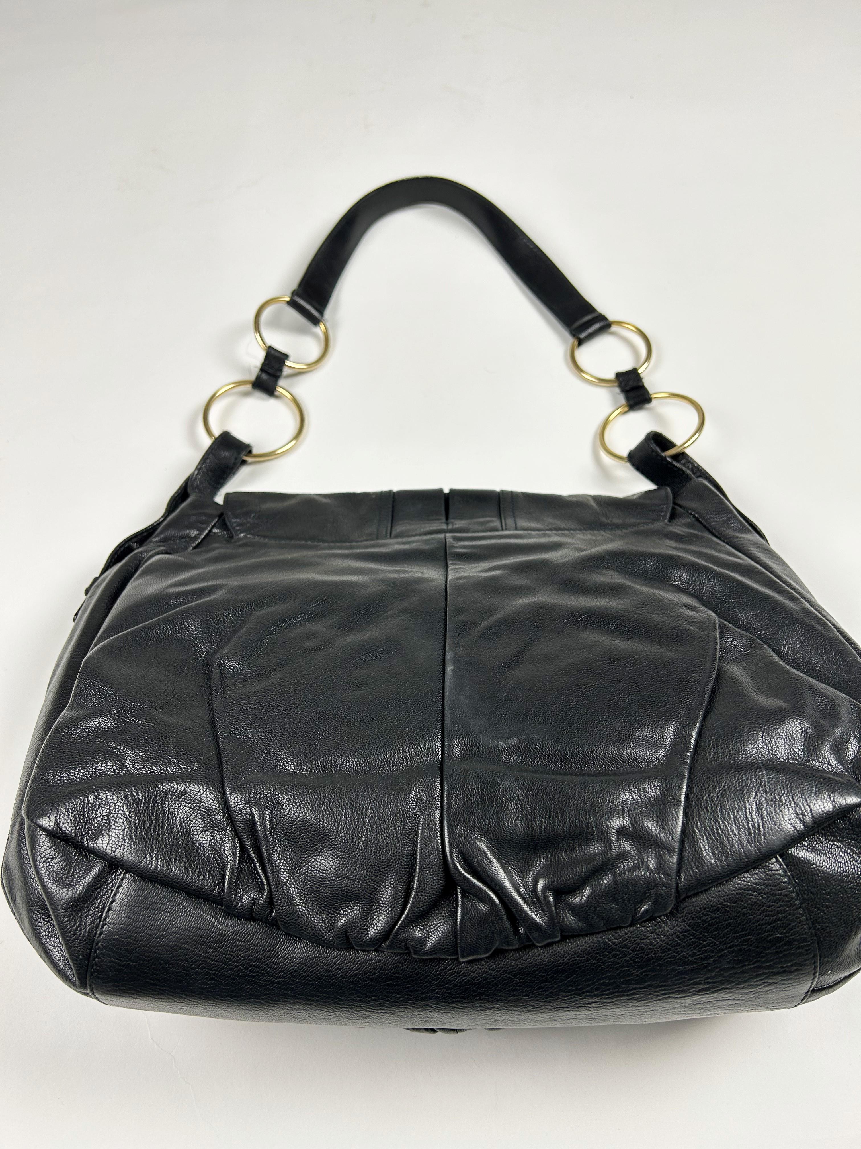 A Black Leather Saharienne bag by Yves Saint Laurent Rive Gauche Circa 1980 In Good Condition In Toulon, FR