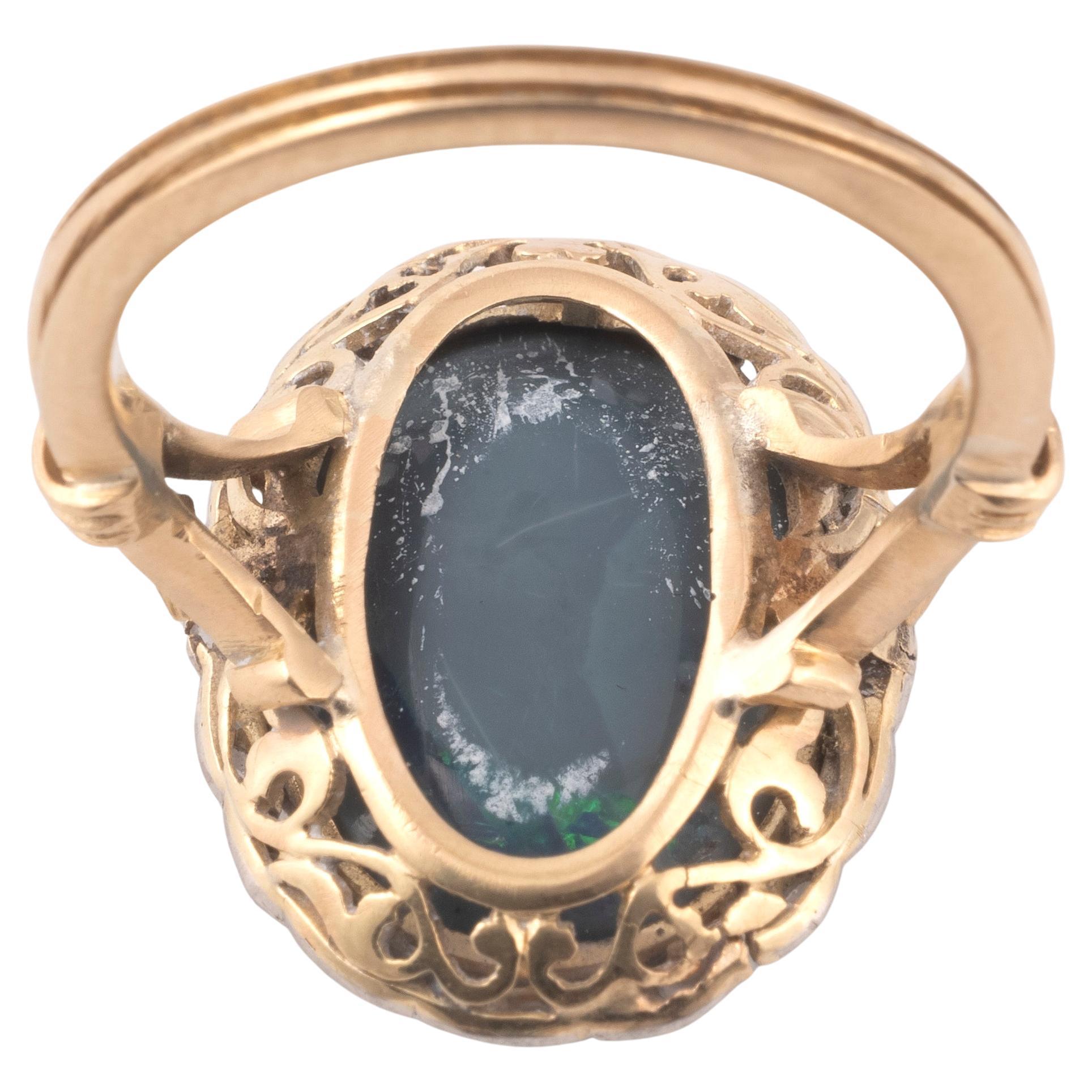 Art Nouveau A Black Opal And Diamond Cluster Ring