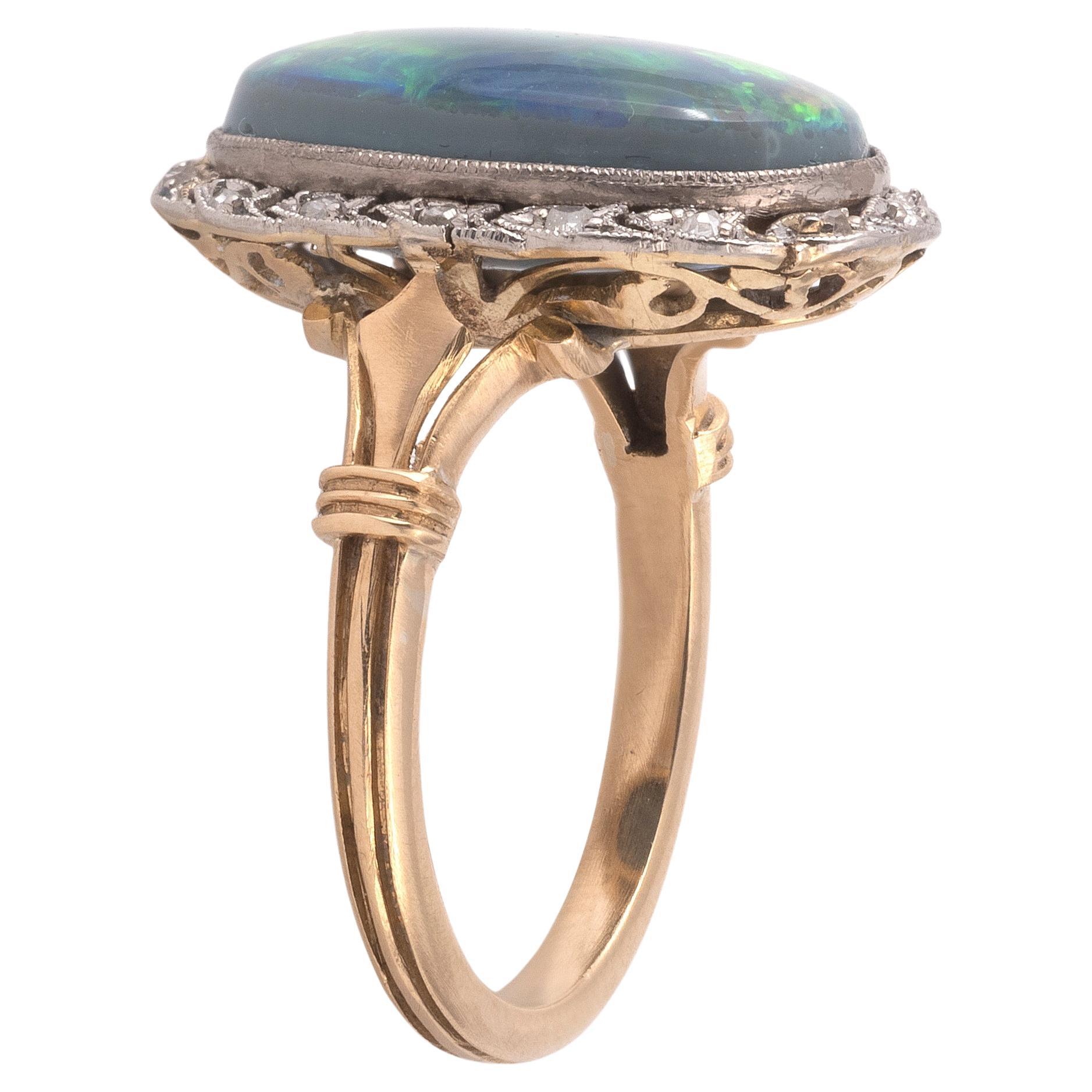 Cabochon A Black Opal And Diamond Cluster Ring