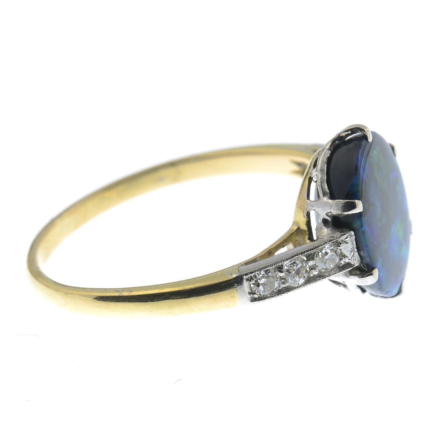 Oval Cut Black Opal Single-Stone and Diamond Ring