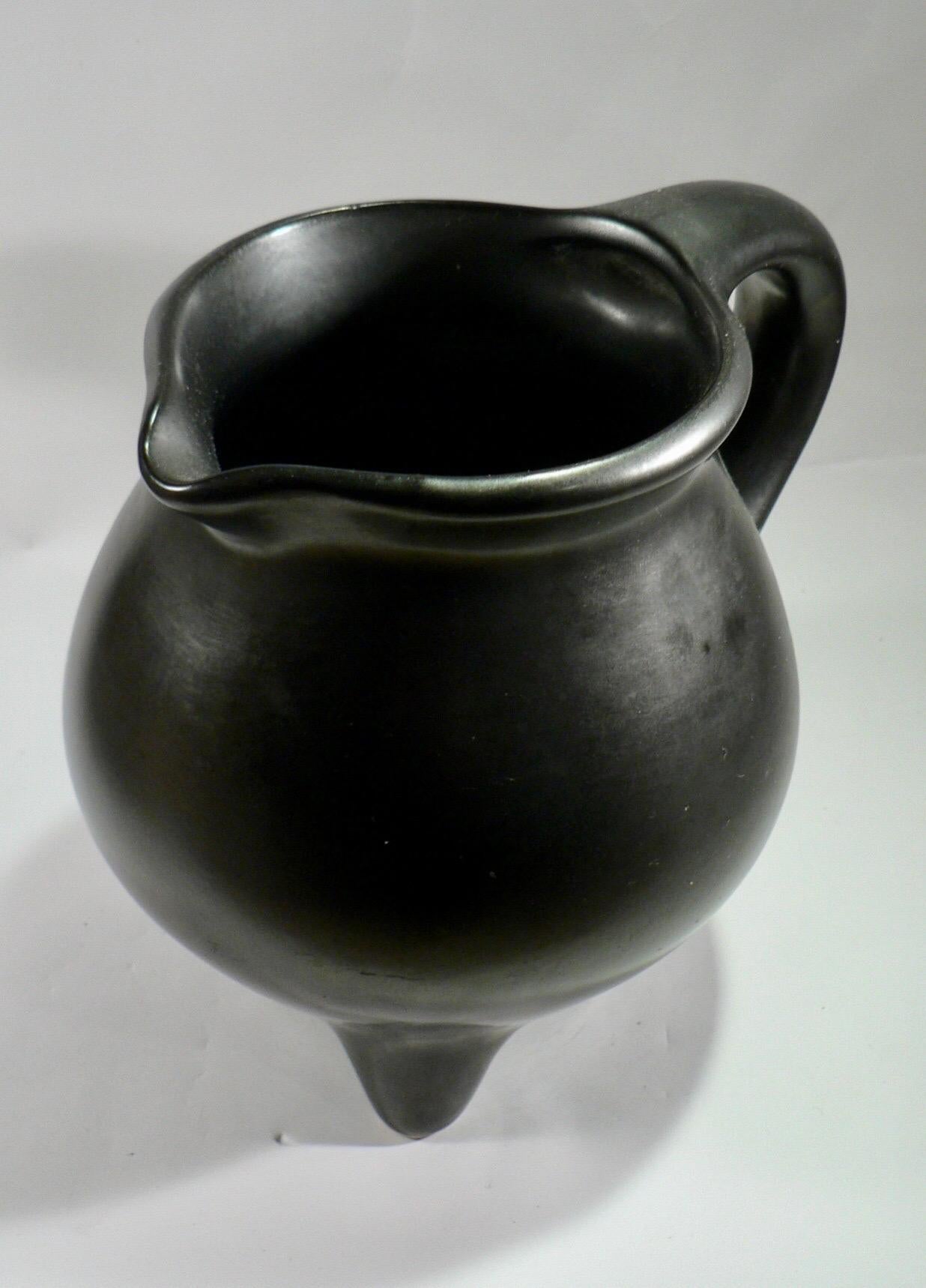 Ceramic A black pitcher with a tripod base from Périgord pottery France 1950 For Sale