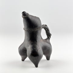 A Black Pottery Tripod Ewer