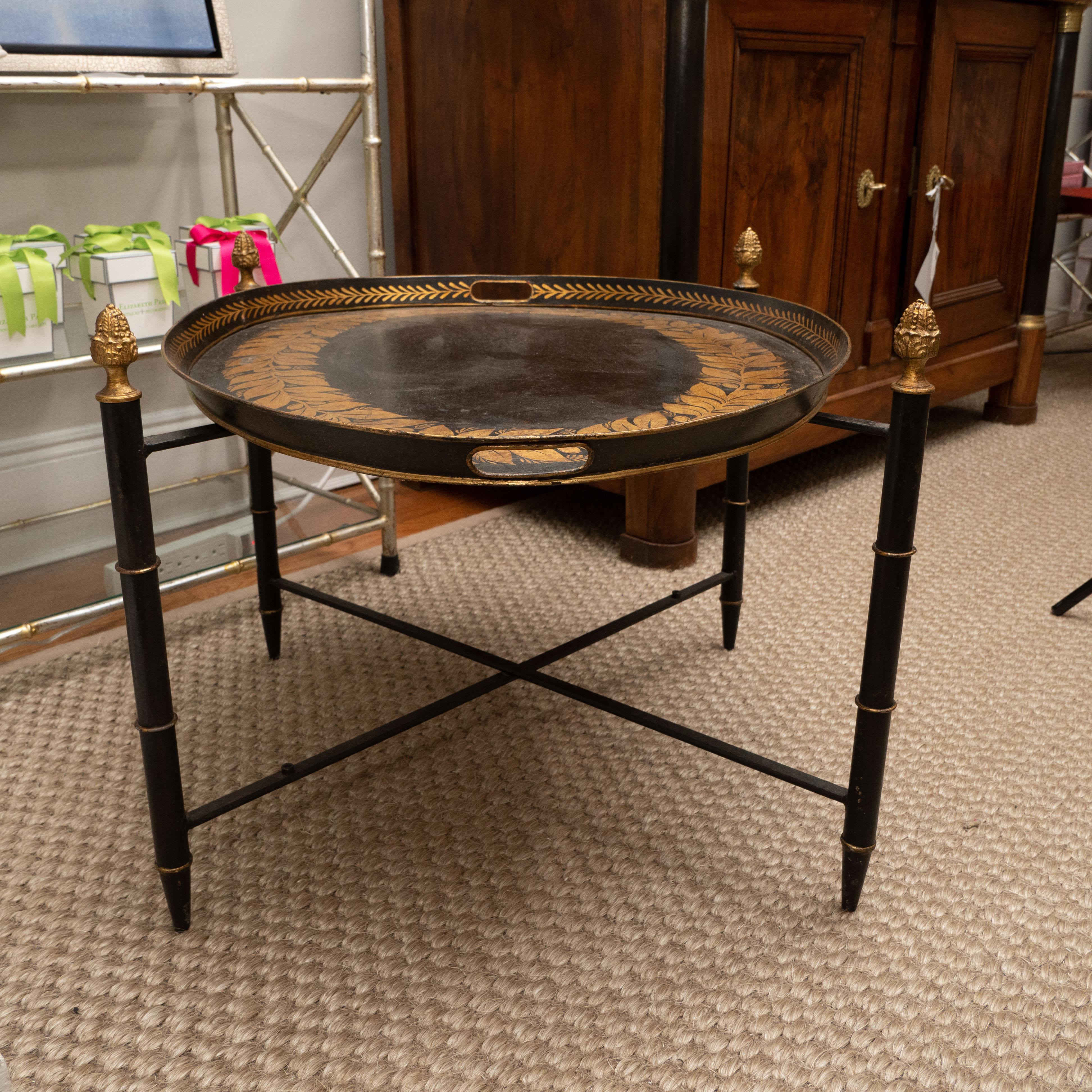 Black Tole Table with Decorative Oval Top and X-Frame Bases 2