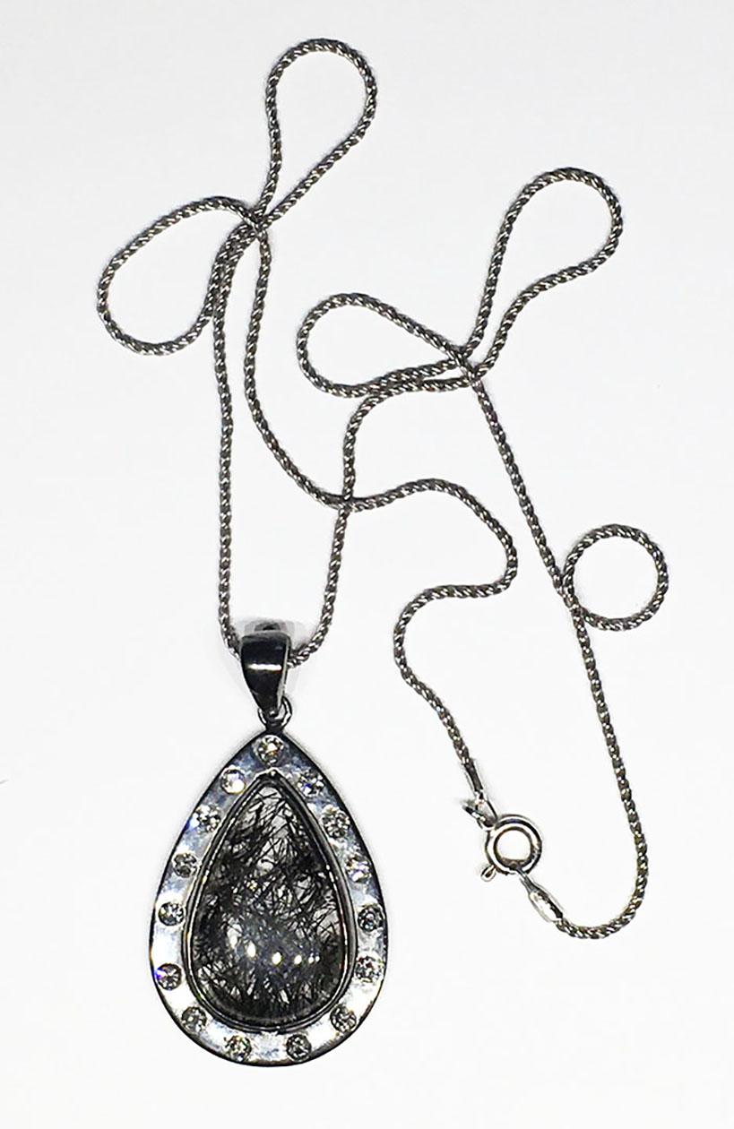 A Champagne Diamond & Quartz Cabochon Pendant, set in darkened Silver For Sale 7