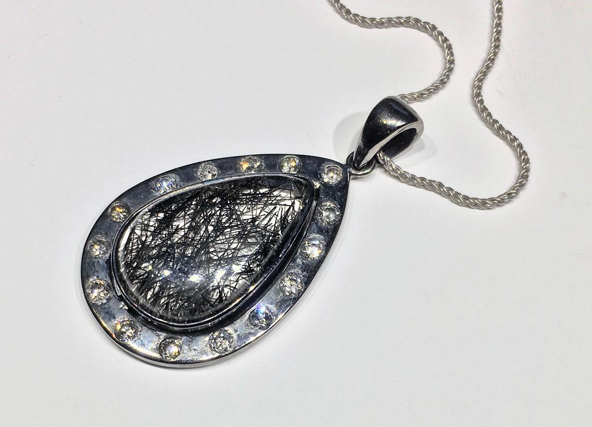 A Champagne Diamond & Quartz Cabochon Pendant, set in darkened Silver For Sale 4