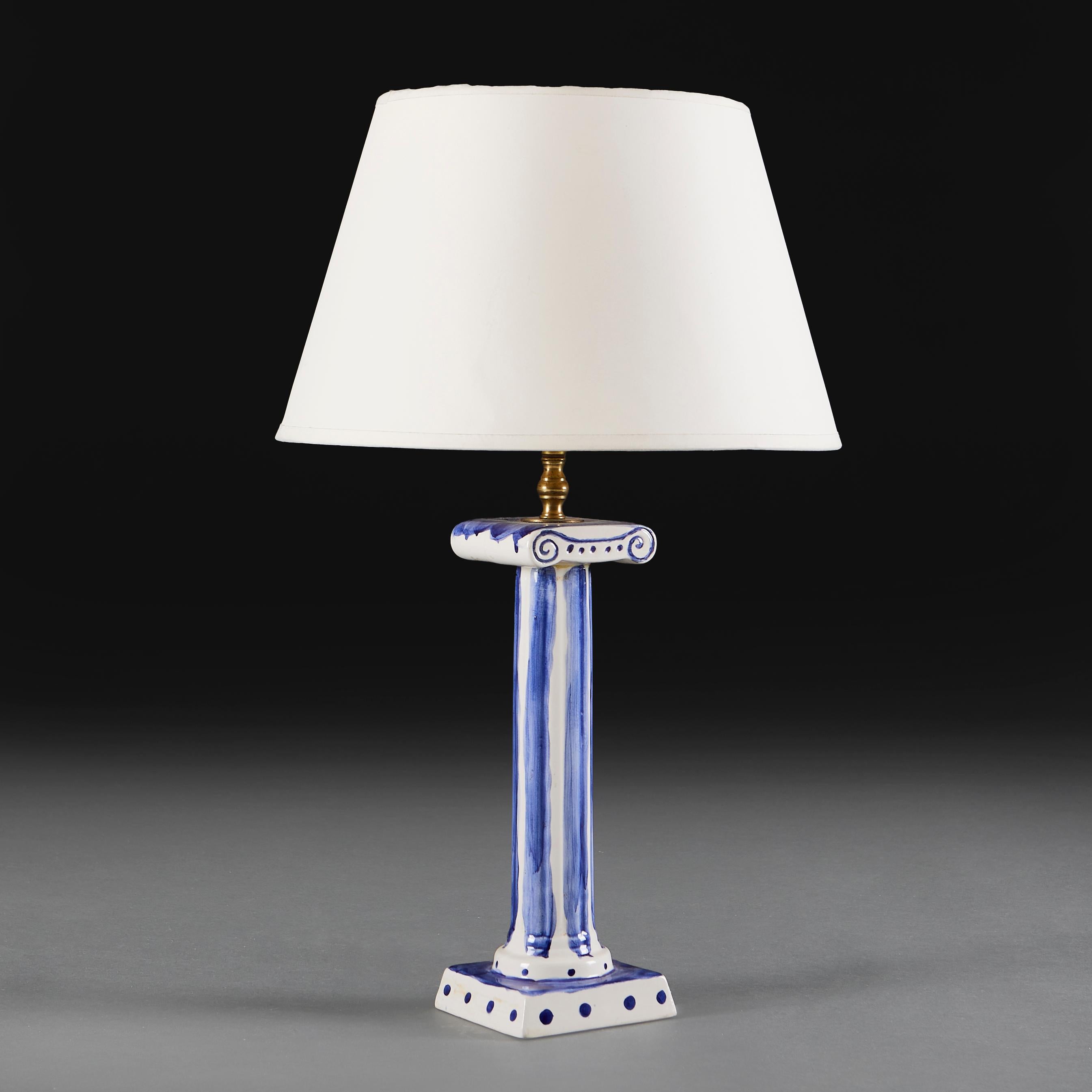 An unusual 20th century Ionic column lamp in the style of the Bloomsbury group.

Please note:

Lampshade not included. Lamp has been photographed with a 14” pale cream Pembroke card lampshade.

Currently wired for the UK with patinated brass plate