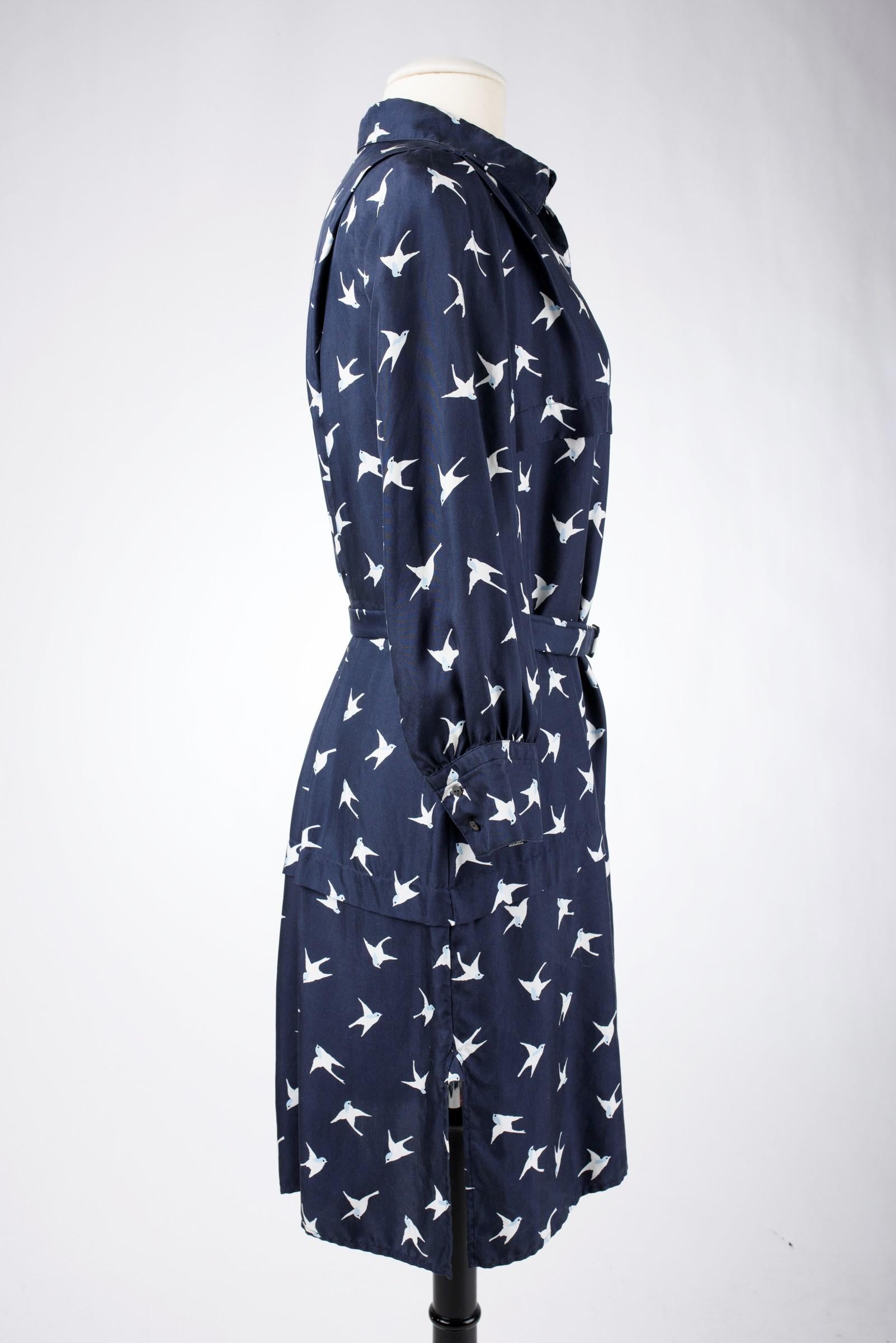 A Blouse dress in navy silk printed with swallows by Nina Ricci Circa 2000 For Sale 3