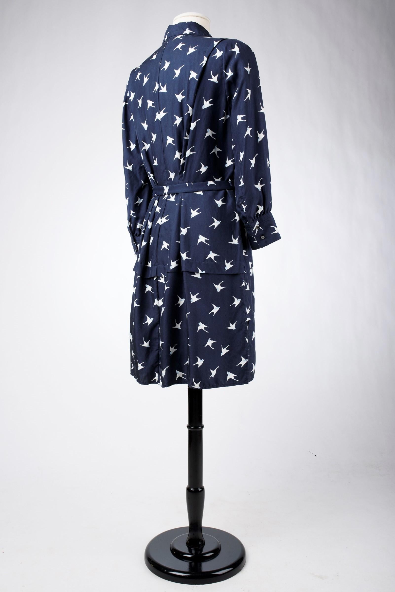 A Blouse dress in navy silk printed with swallows by Nina Ricci Circa 2000 For Sale 4