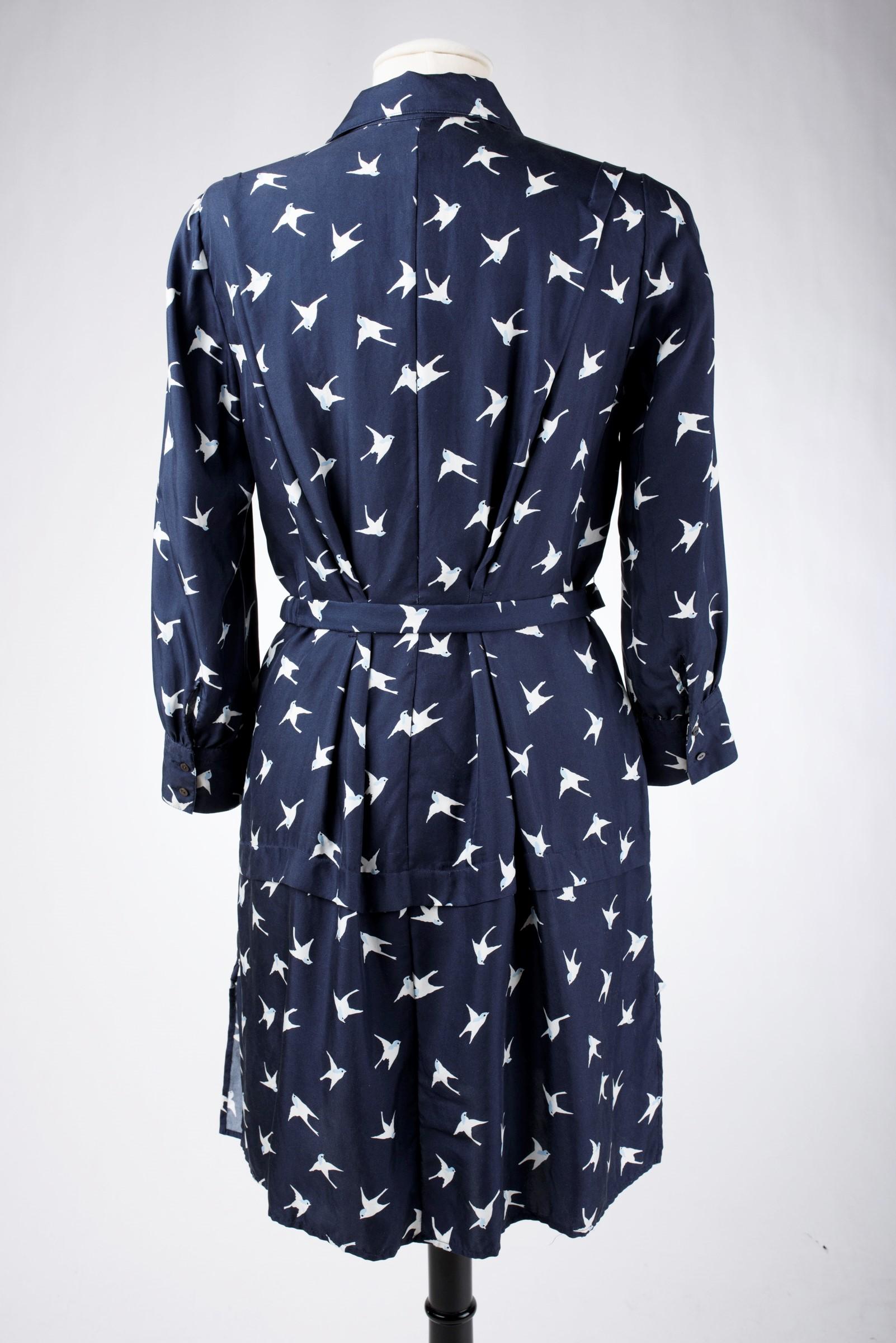 A Blouse dress in navy silk printed with swallows by Nina Ricci Circa 2000 For Sale 8
