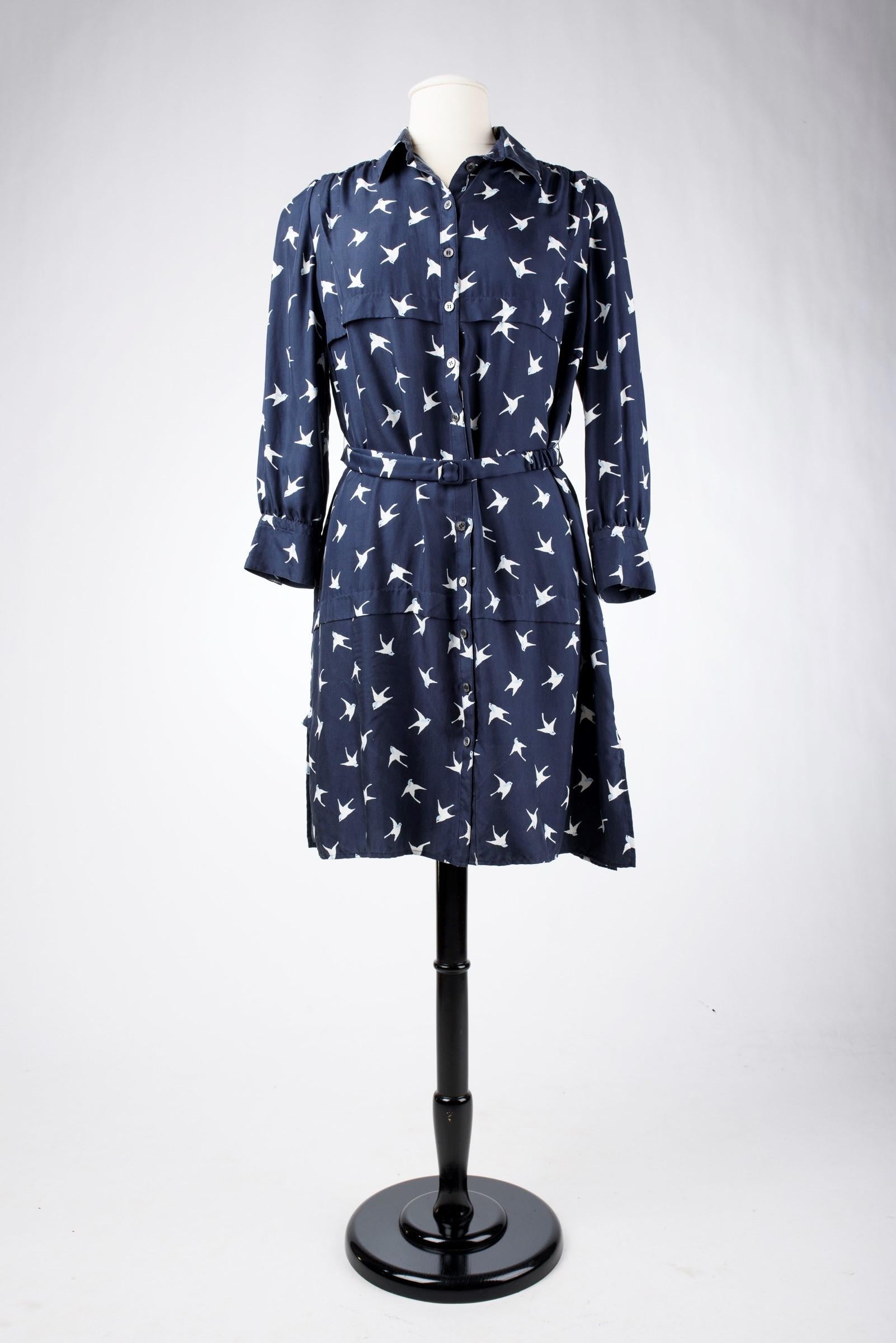Black A Blouse dress in navy silk printed with swallows by Nina Ricci Circa 2000 For Sale
