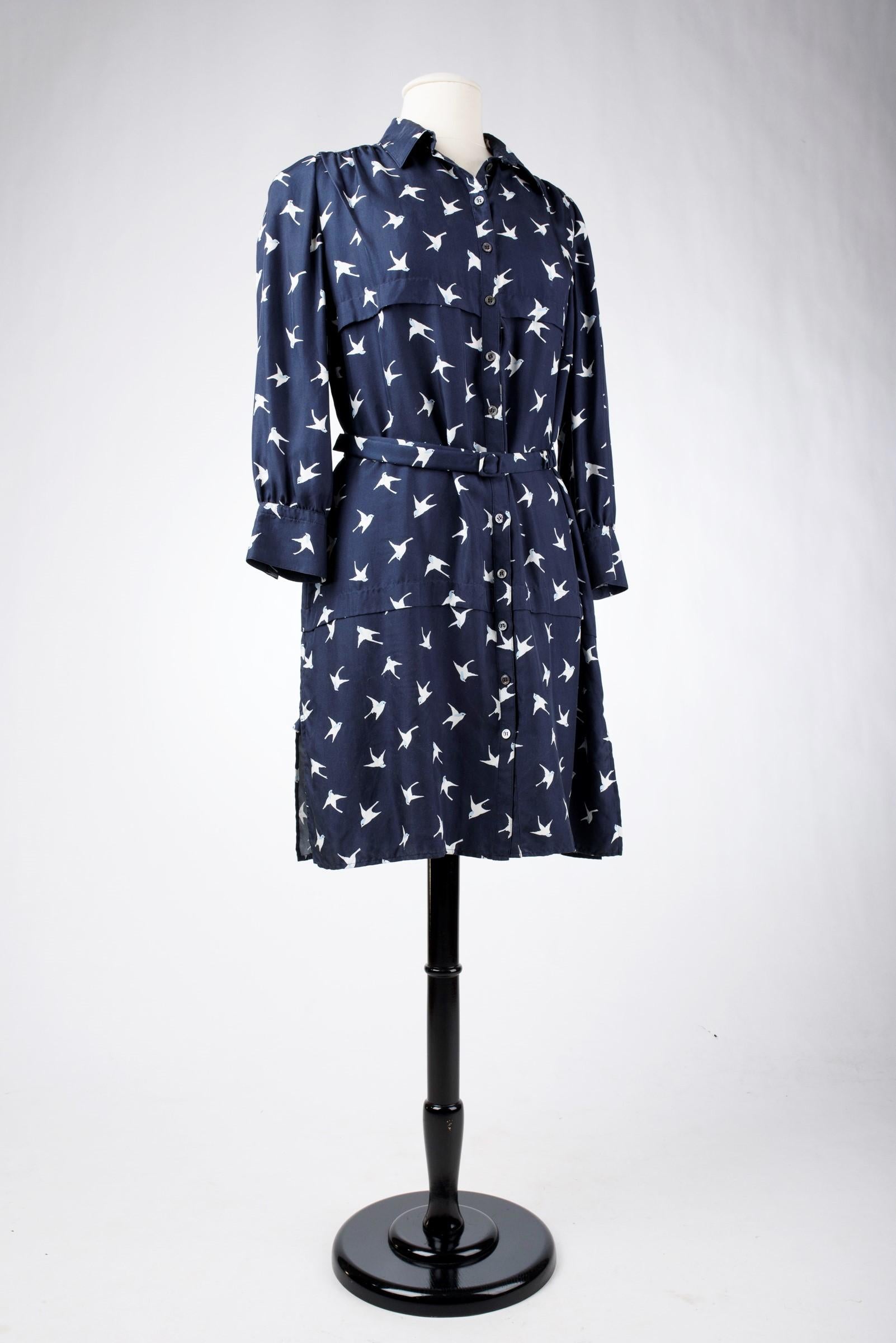 A Blouse dress in navy silk printed with swallows by Nina Ricci Circa 2000 For Sale 1