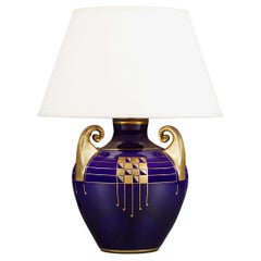 A Blue And Gold Art Deco Lamp