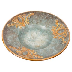 A blue and orange ceramic Art Deco plate by Michael Andersen, Denmark, 1940s