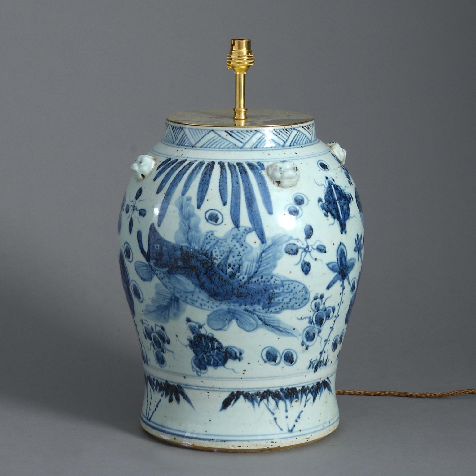 A blue and white glazed porcelain vase, of good scale, decorated throughout with fish swimming amongst seaweed.