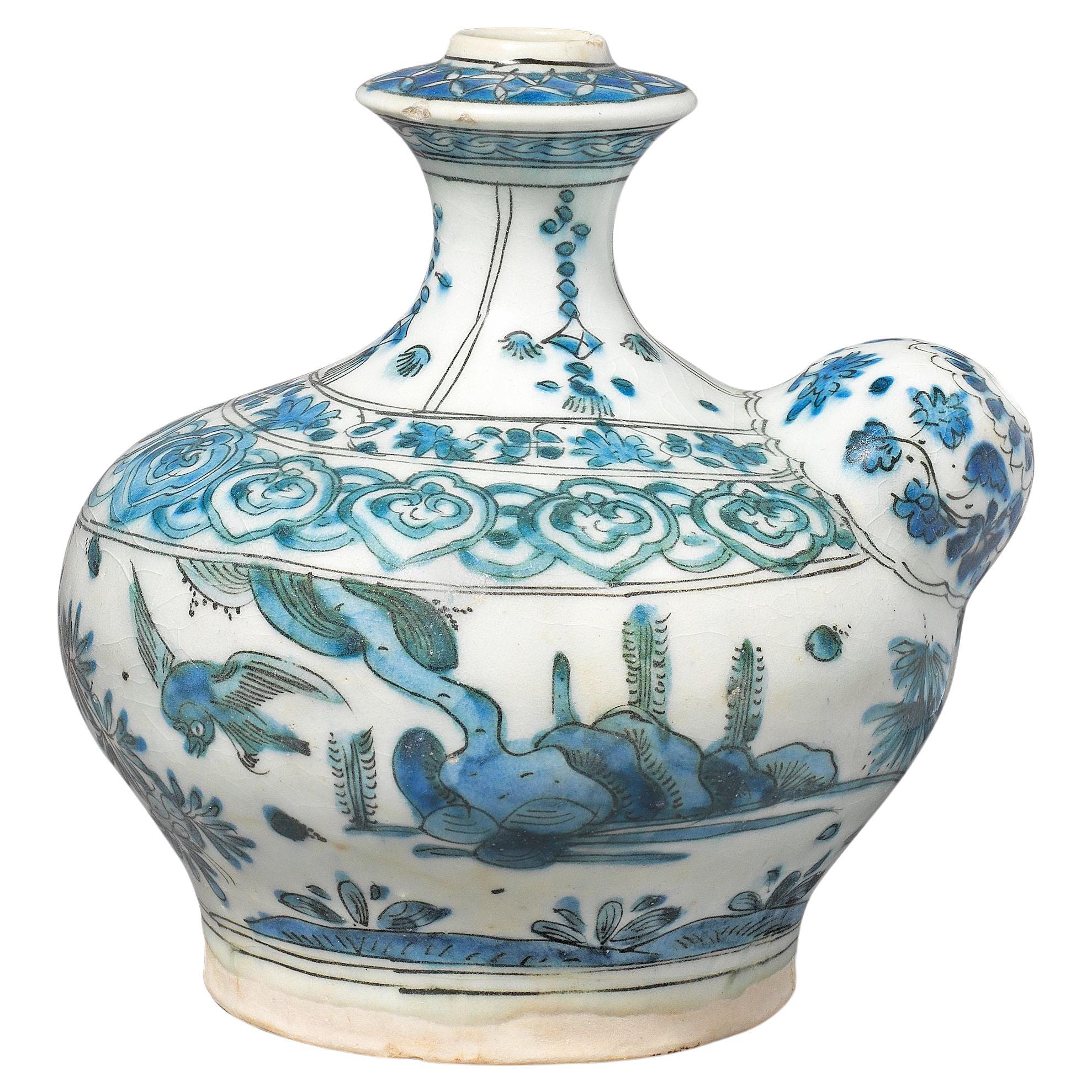 A Blue And White Safavid Underglaze-Painted Pottery Kendi, 17TH Century im Angebot