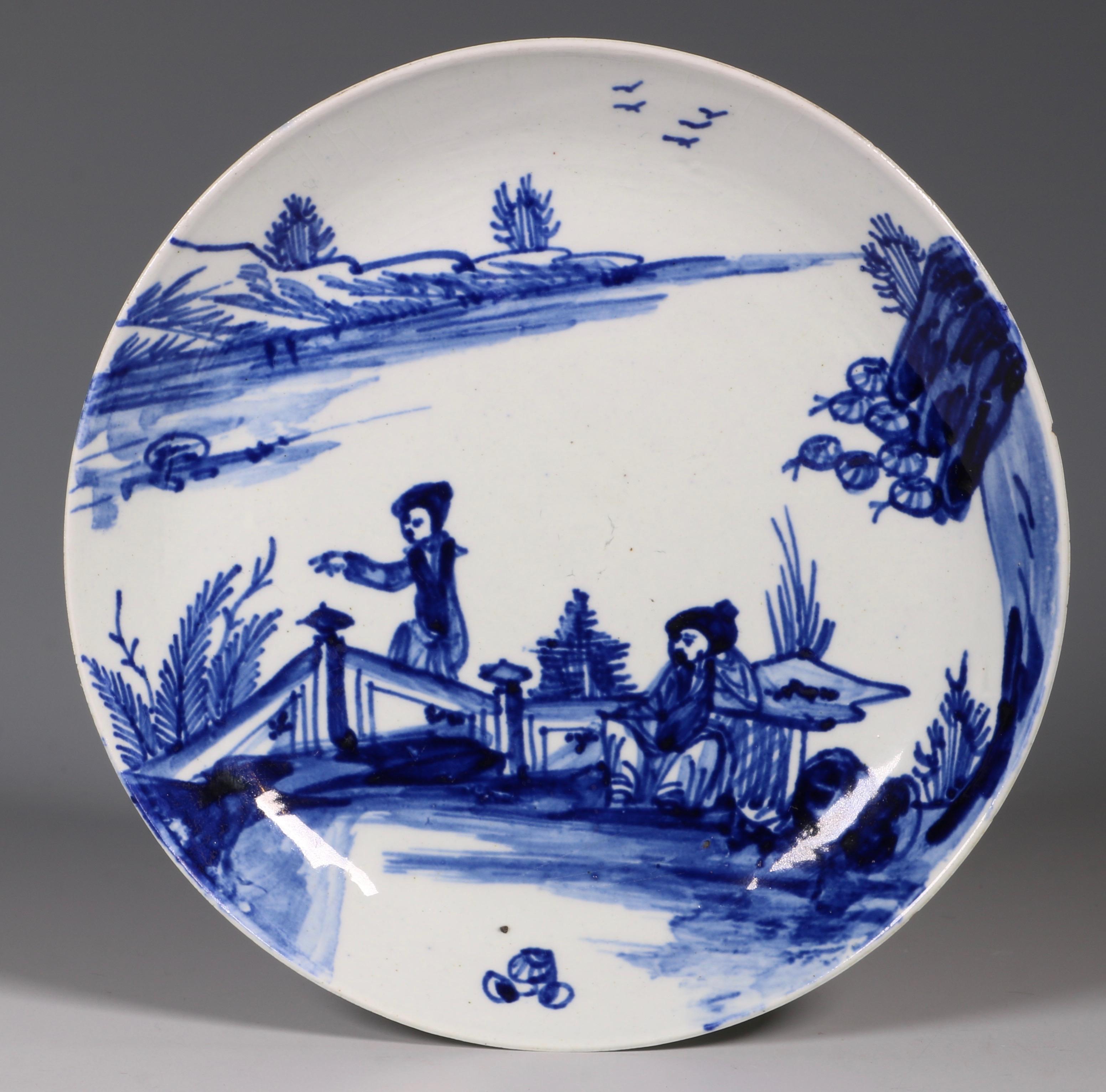 A blue and white Vauxhall tea bowl and saucer. Thinly potted and decorated in a bright 'wet' blue with two figures in an oriental landscape.

Vauxhall, circa 1755-1758.
