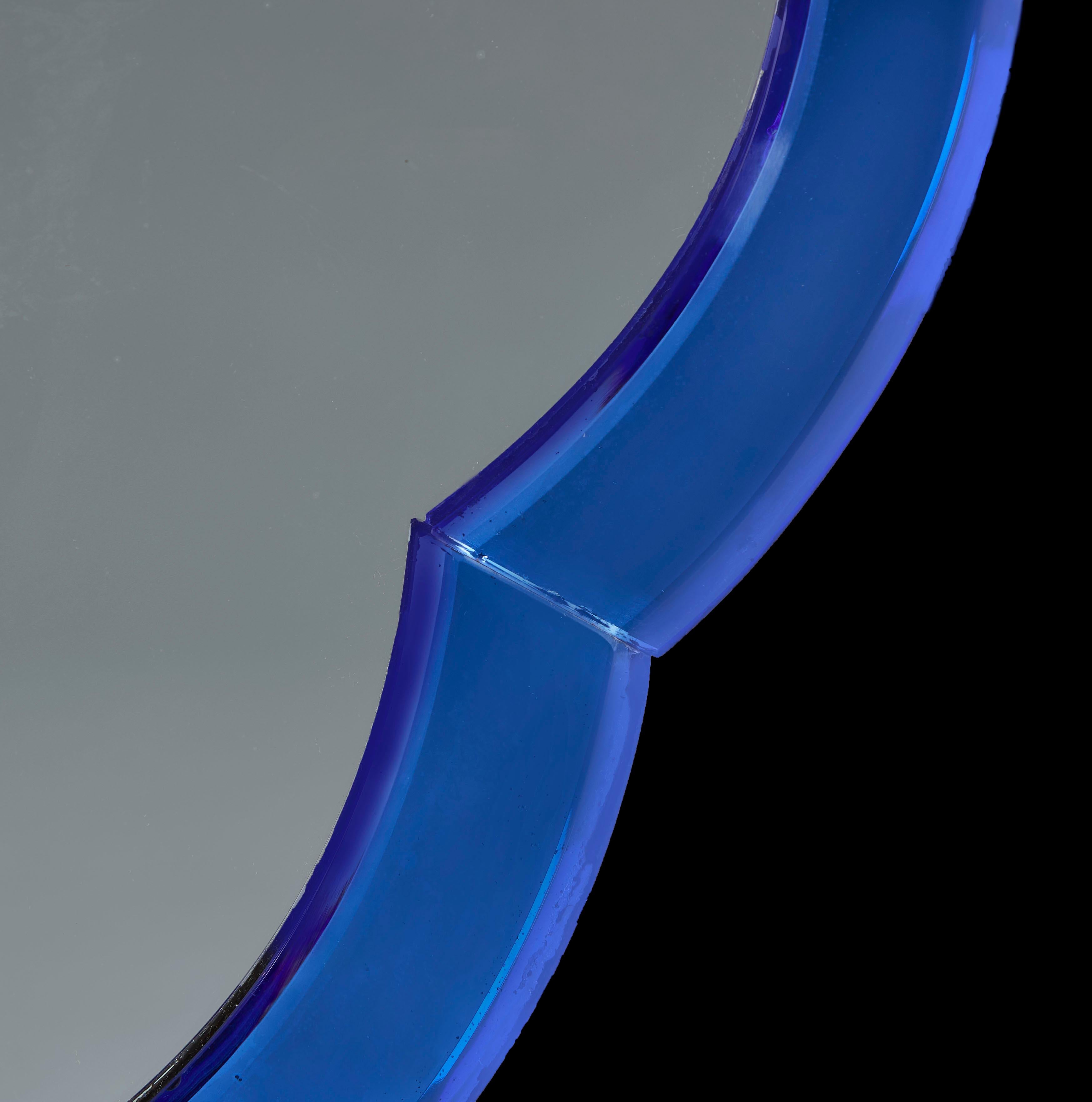 French A blue art deco hexafoil mirror 