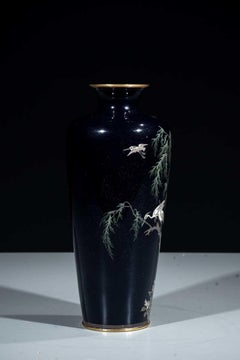 A blue-ground cloisonné vase depicting herons and a weeping willow