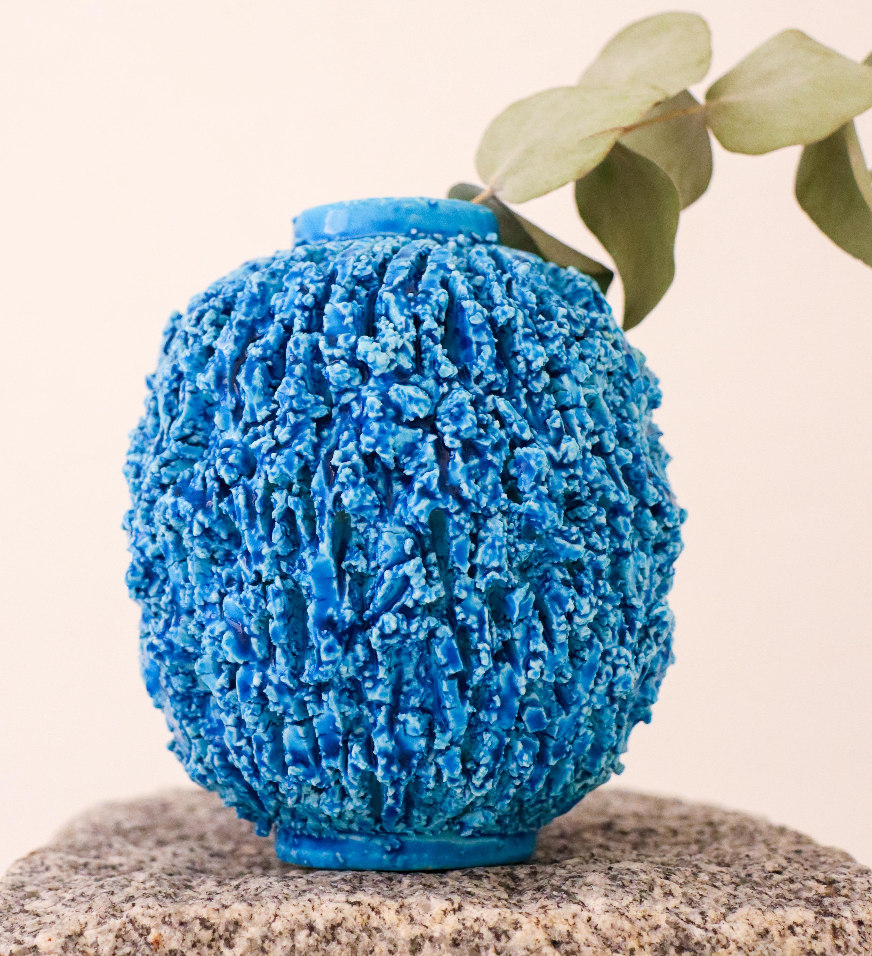 A blue Hedgehog-vase designed by Gunnar Nylund at Rörstrand. It is 11 cm (4.4