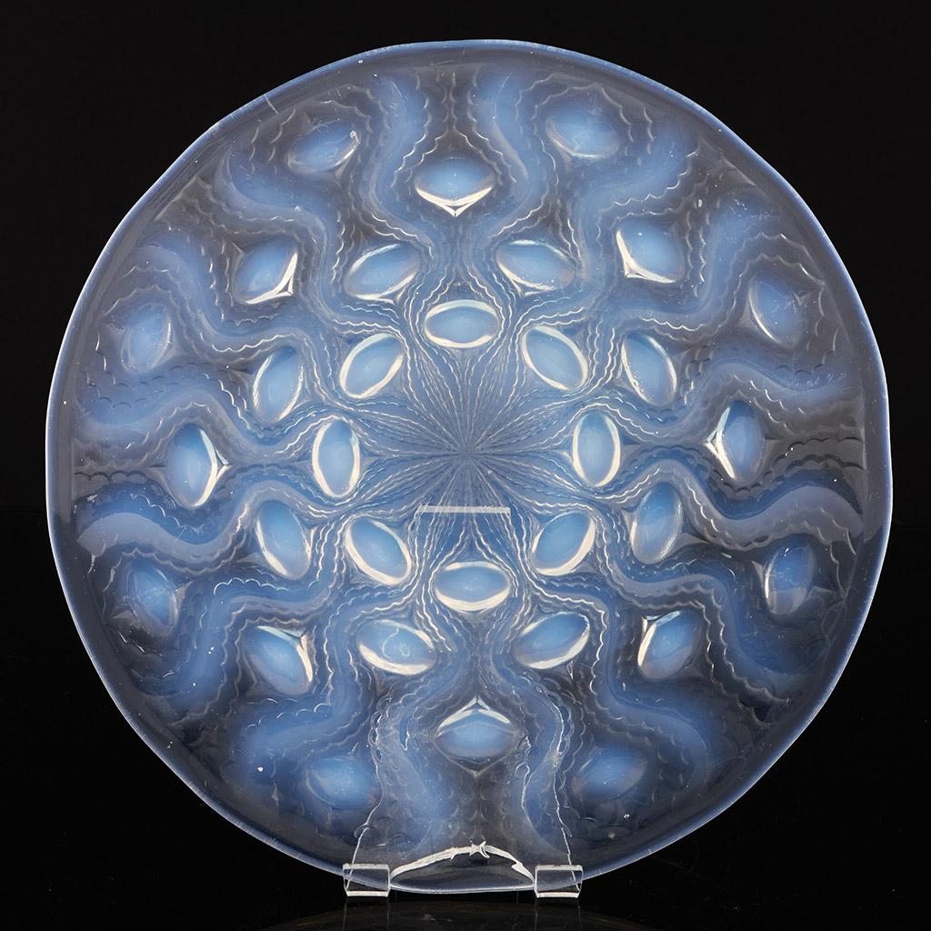 Bulbes No.2', an Art Deco opalescent and frosted glass plate by René Lalique with bulb details. Signed R Lalique France to centre.

René Jules Lalique (French, 1860–1945) was a renowned jeweller and master glassmaker. As one of the leading figures