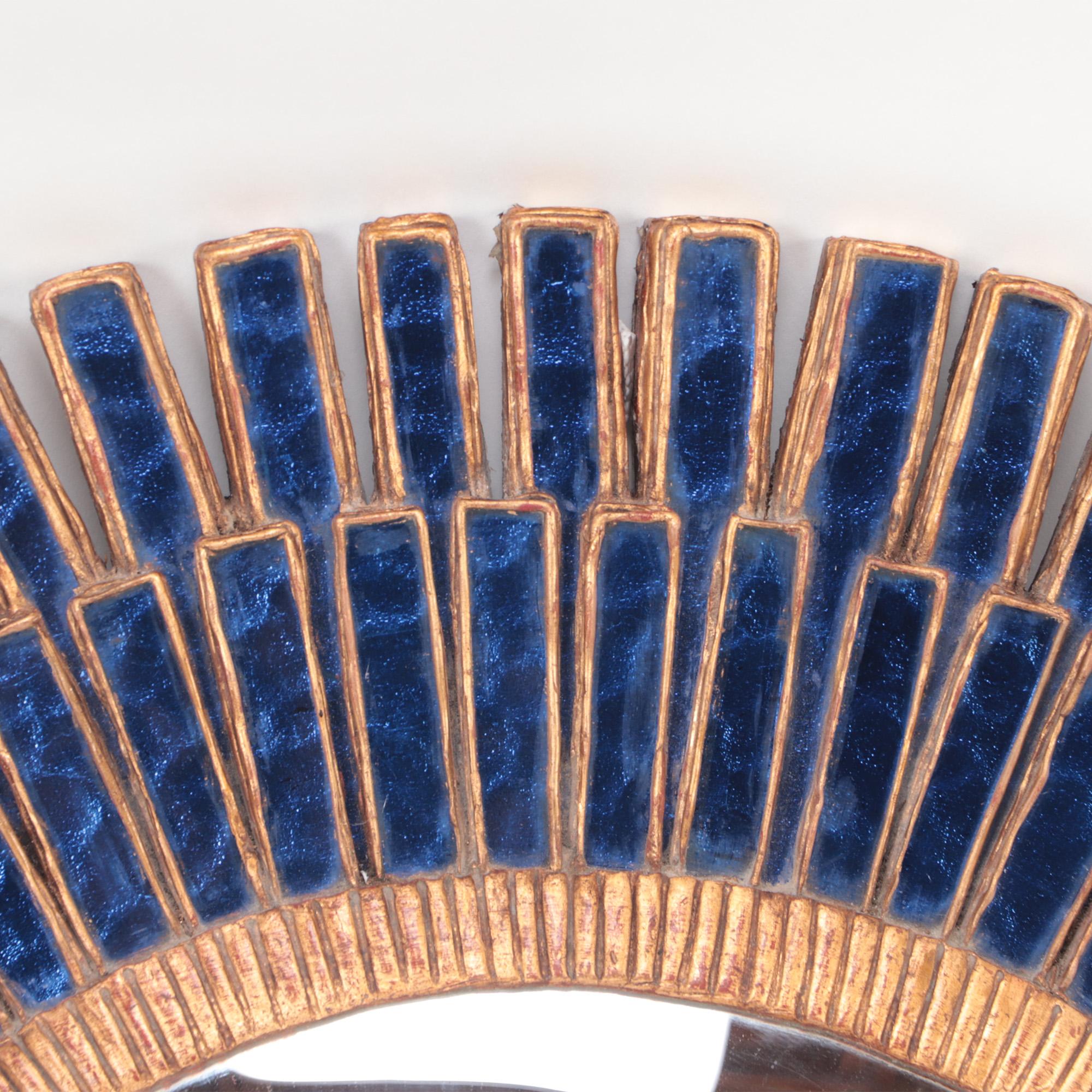 A blue talosel and resin convex mirror in the manner of Line Vautrin, French. Contemporary.