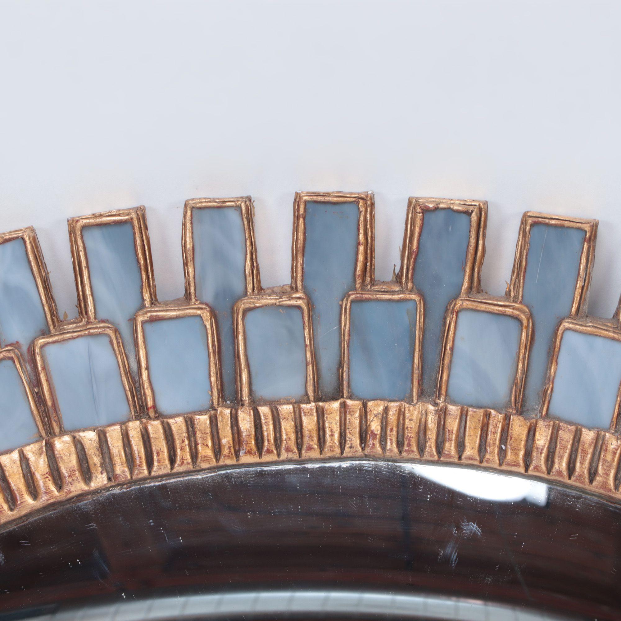 A large blue talosel and resin convex mirror in the manner of Line Vautrin. Contemporary.