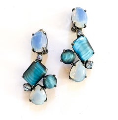 A blue 'tiger skin' paste brooch and matching earrings, Elsa Schiaparelli c1954.