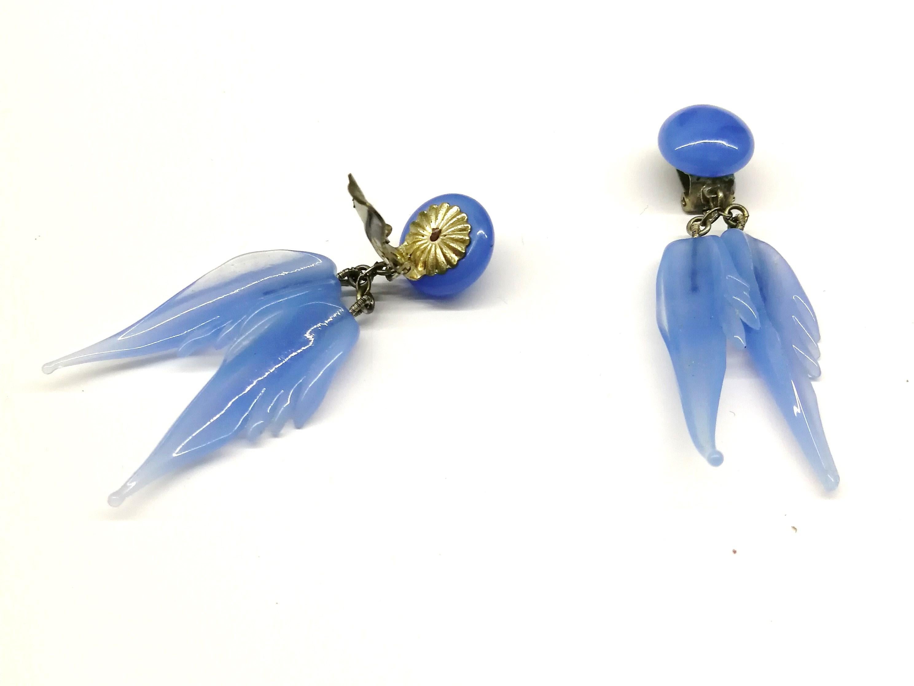 A bluebell blue moulded glass 'feather' motif' necklace and earrings, 1950s. 8