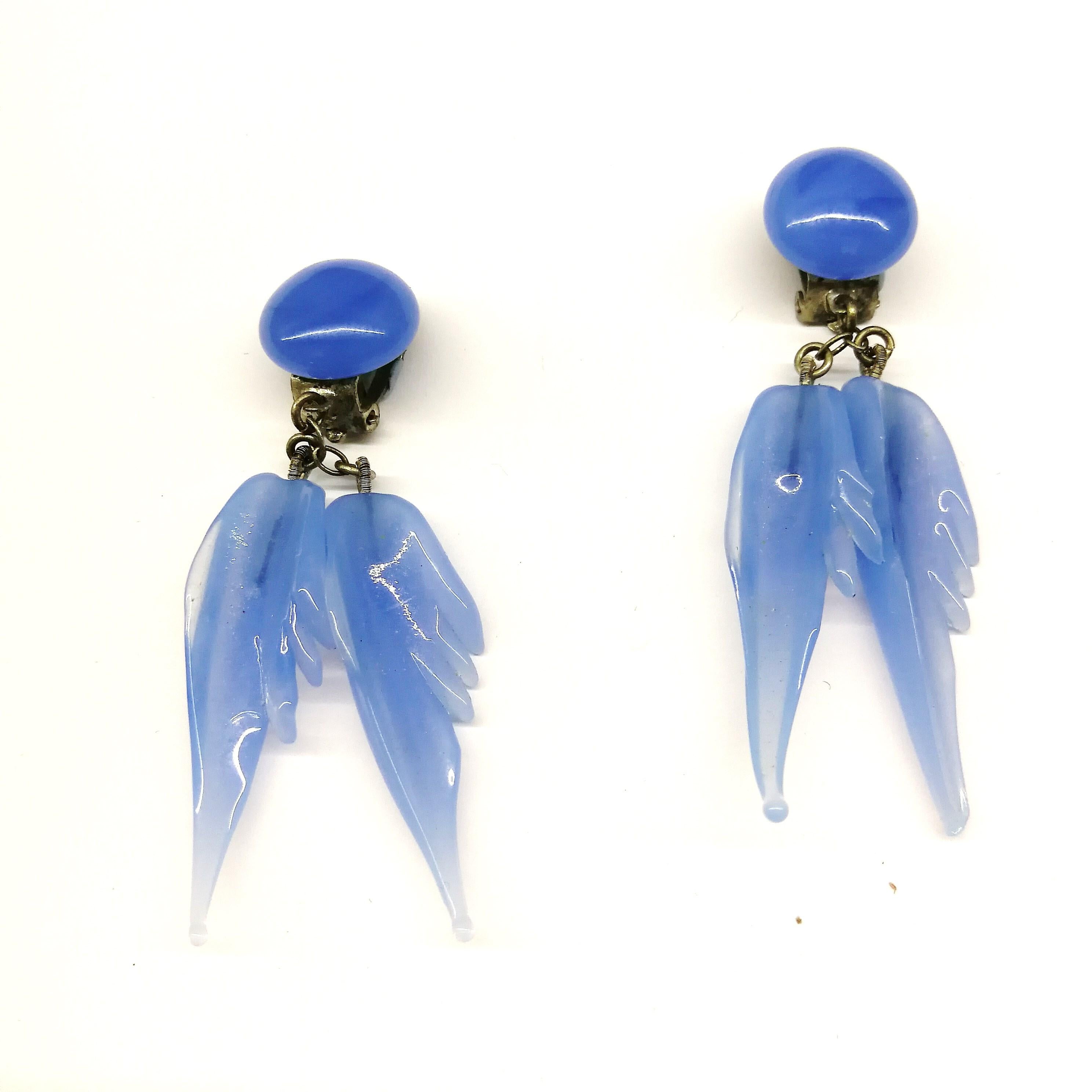 A bluebell blue moulded glass 'feather' motif' necklace and earrings, 1950s. 10