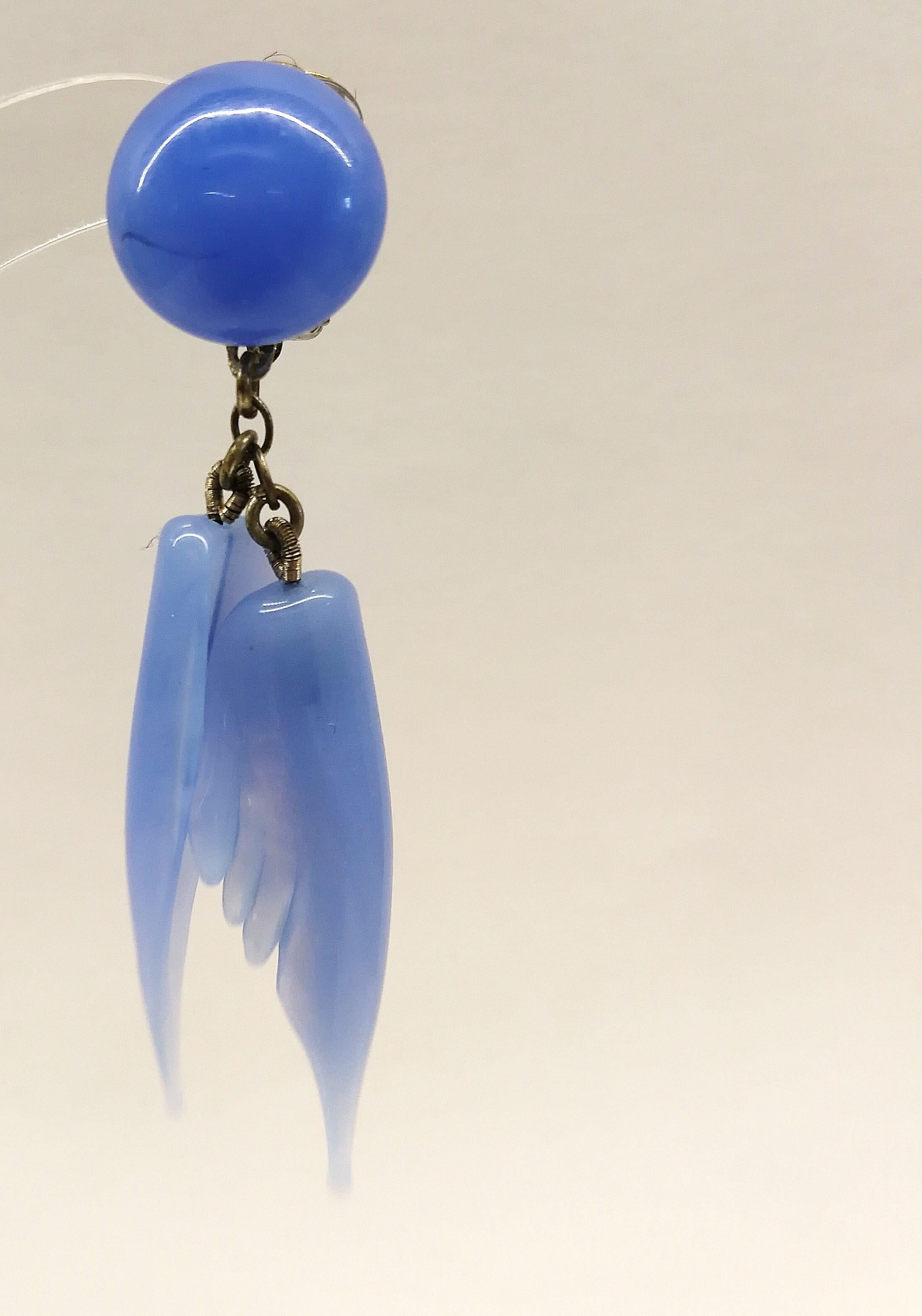 A bluebell blue moulded glass 'feather' motif' necklace and earrings, 1950s. 11