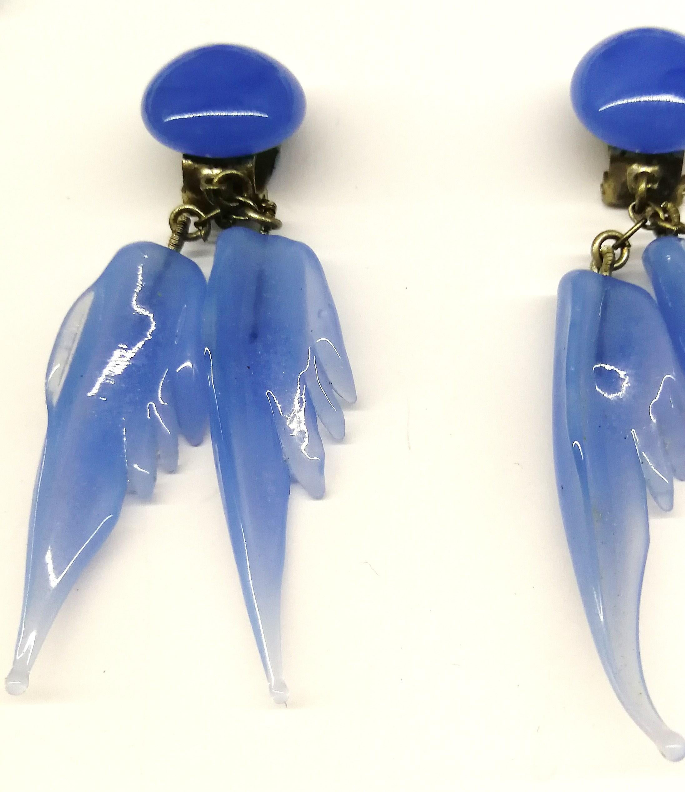 A bluebell blue moulded glass 'feather' motif' necklace and earrings, 1950s. 2