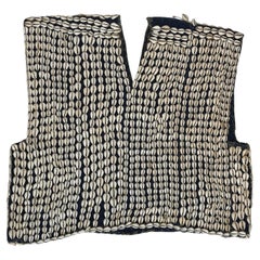 A Bobo ceremonial top decorated with cowrie shells