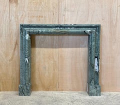 A bolection style Connemara Marble Mantel, Fireplace by Ryan & Smith