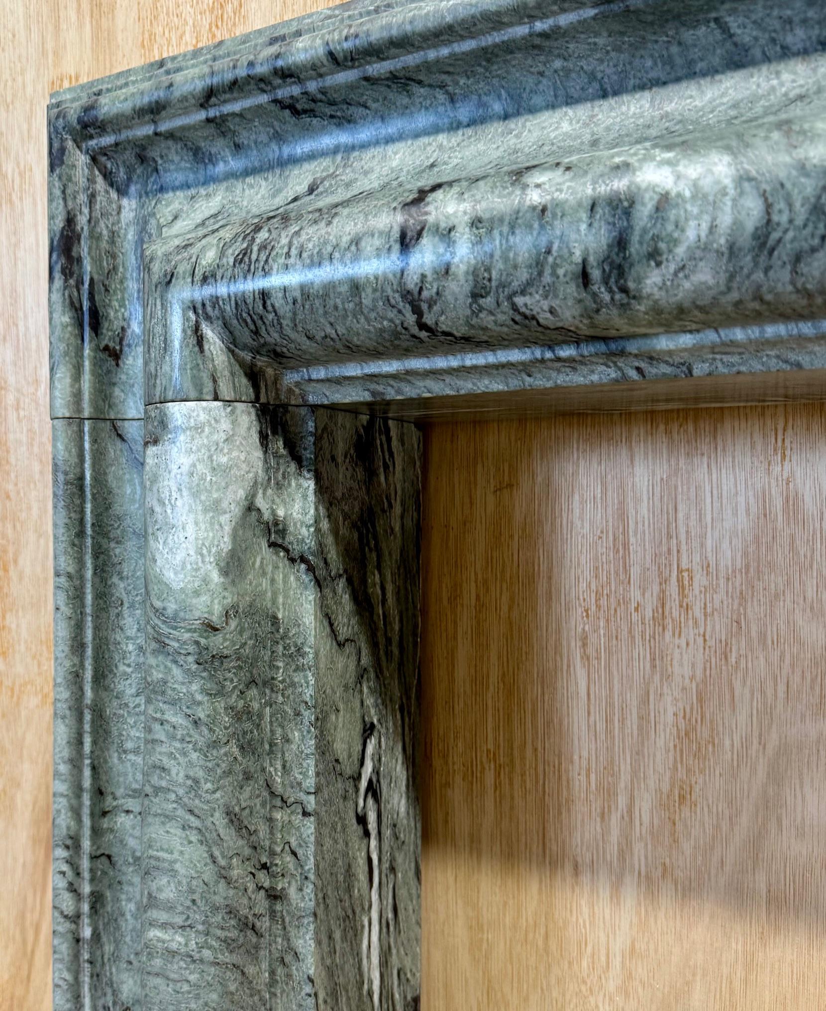 A bolection style Connemara Marble Mantel, Fireplace by Ryan & Smith In New Condition For Sale In Tyrone, Northern Ireland