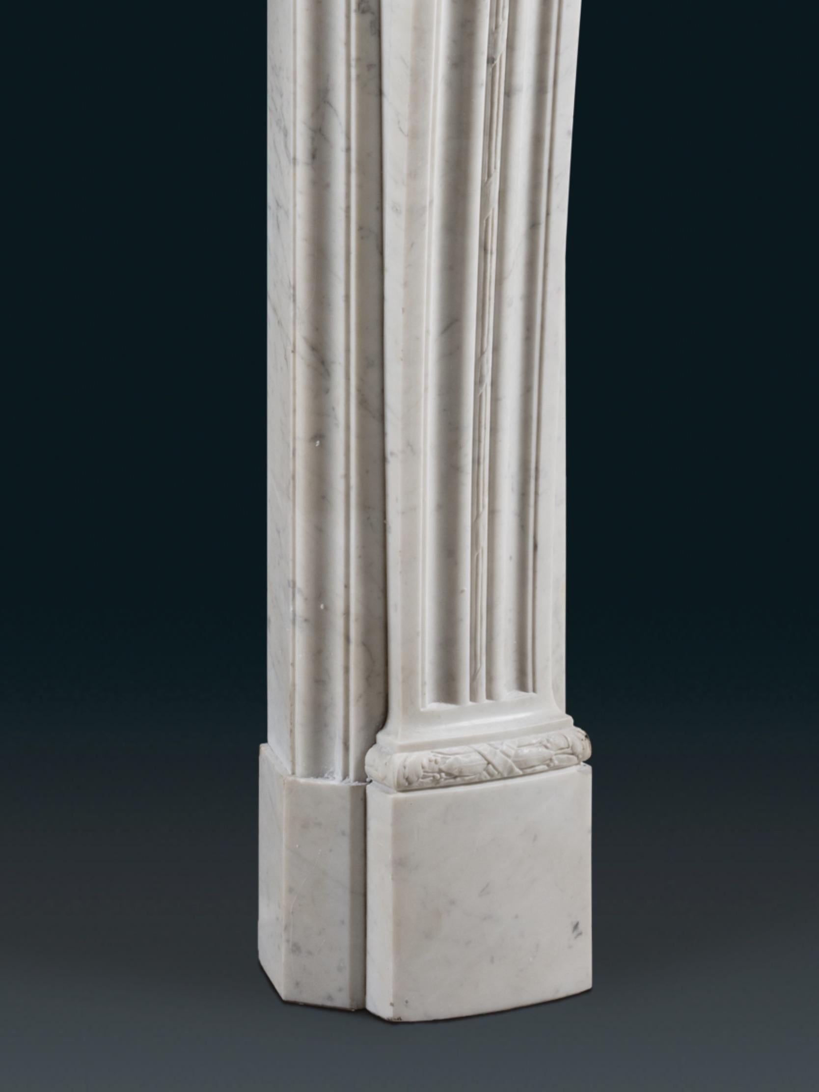 Carrara Marble A Bowed 19th Century Louis XVI Style Chimneypiece For Sale