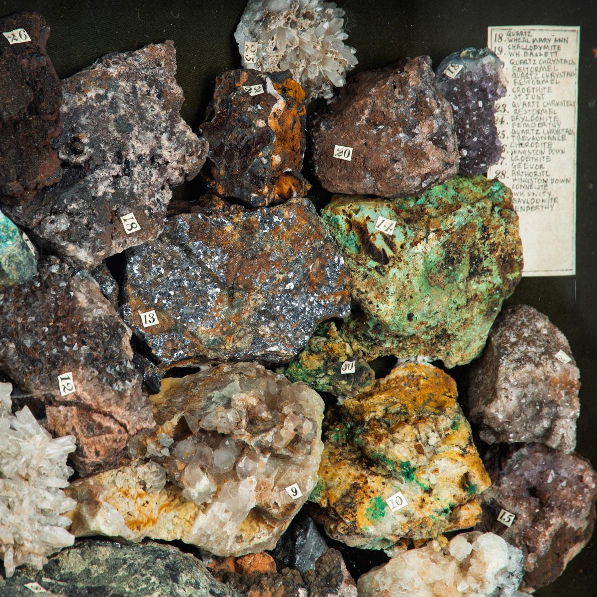 A boxed collection of 30 Cornish minerals, presented in the original black and gilt glazed wooden box, the specimens numbered with corresponding keys to the left and right, inscribed ‘Minerals from Cornish Mines’.  London, circa 1900.


