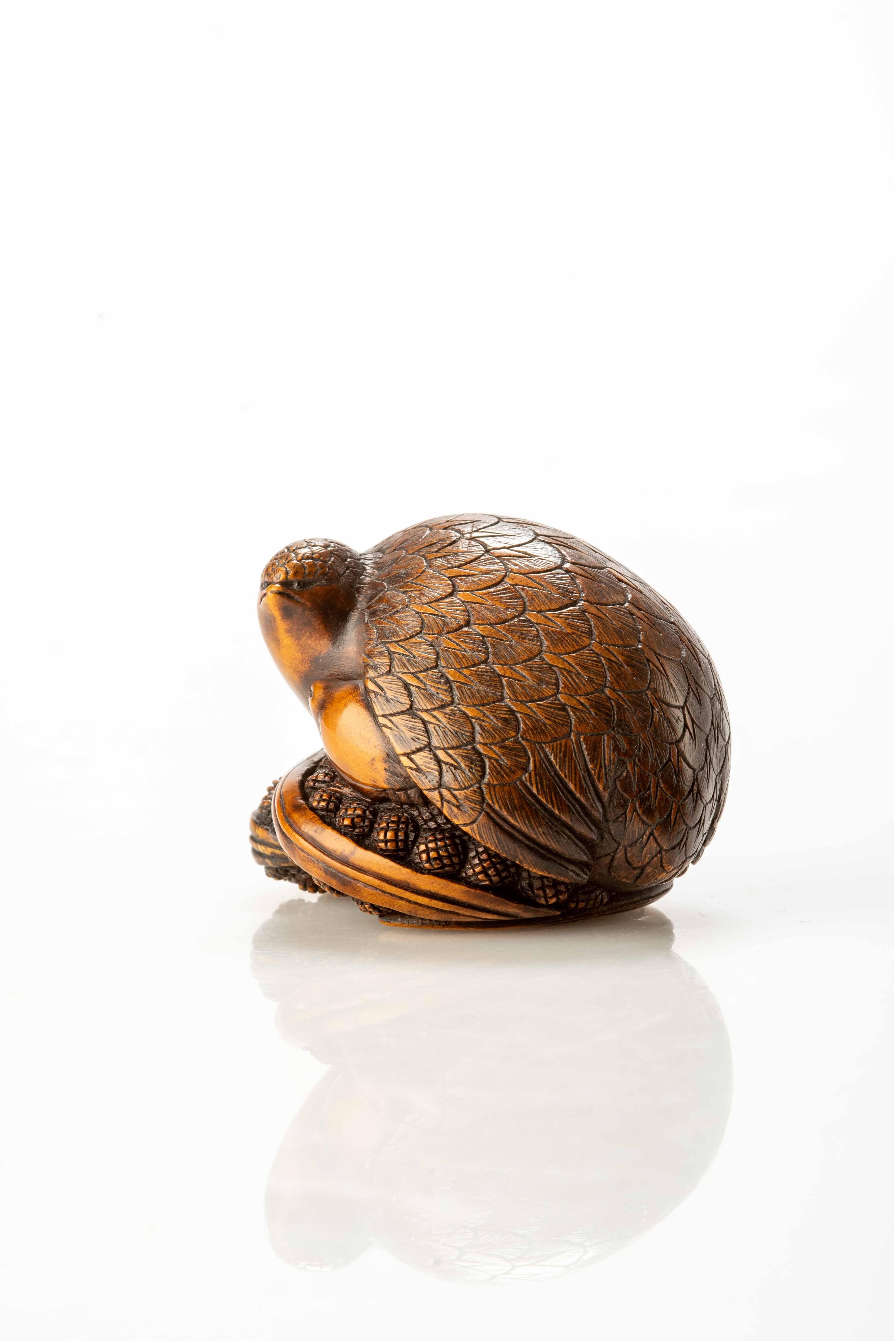 Japanese A Boxwood Netsuke Depicting A Pair Of Quails Crouching On Millet