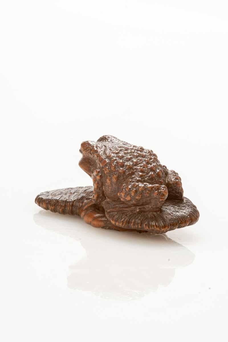 Japonisme A Boxwood Netsuke Depicting A Toad Resting On A Sandal For Sale