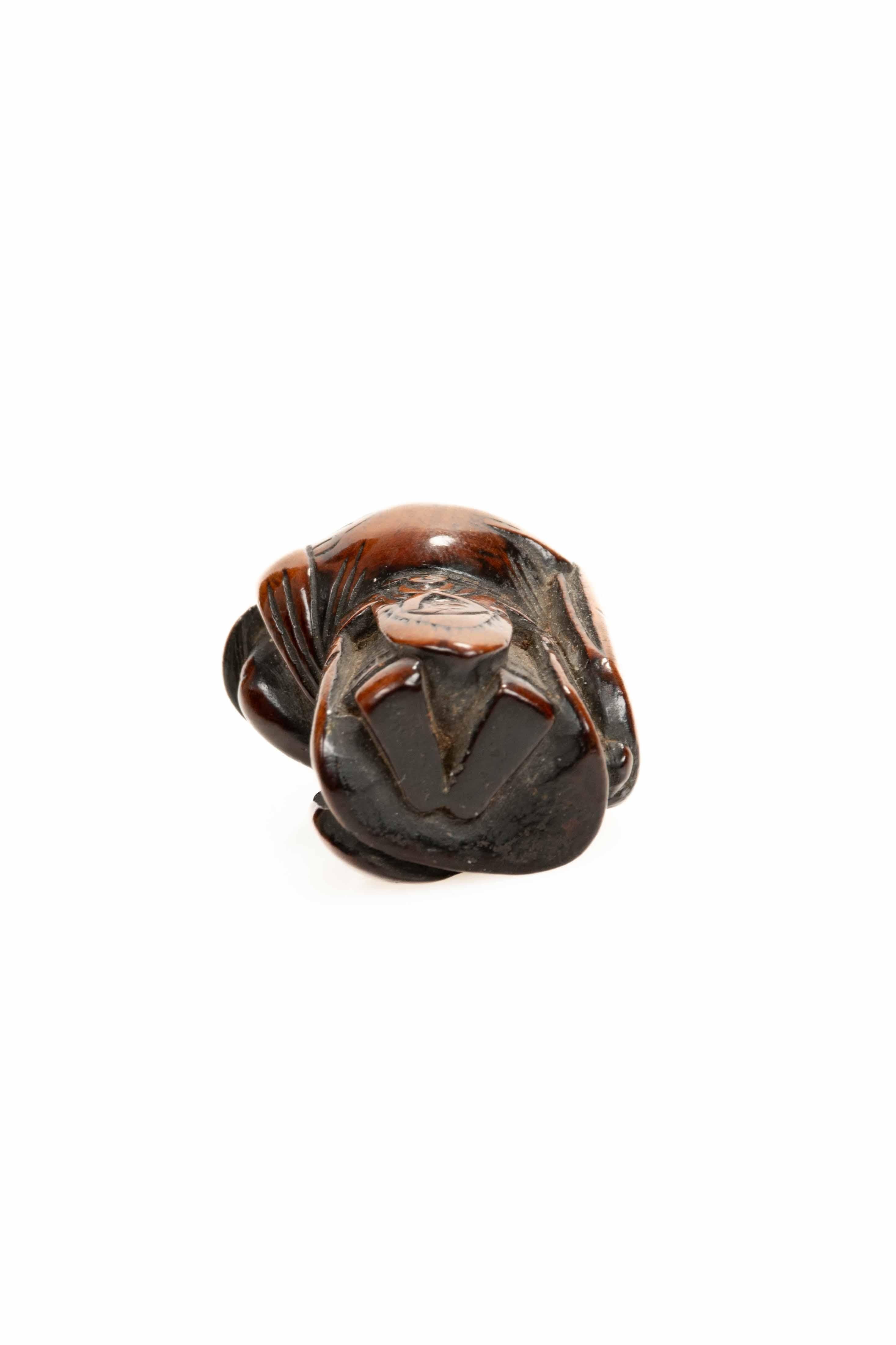 A boxwood netsuke depicting the Chinese general Guan Yu In condizioni ottime in vendita a Milano, IT