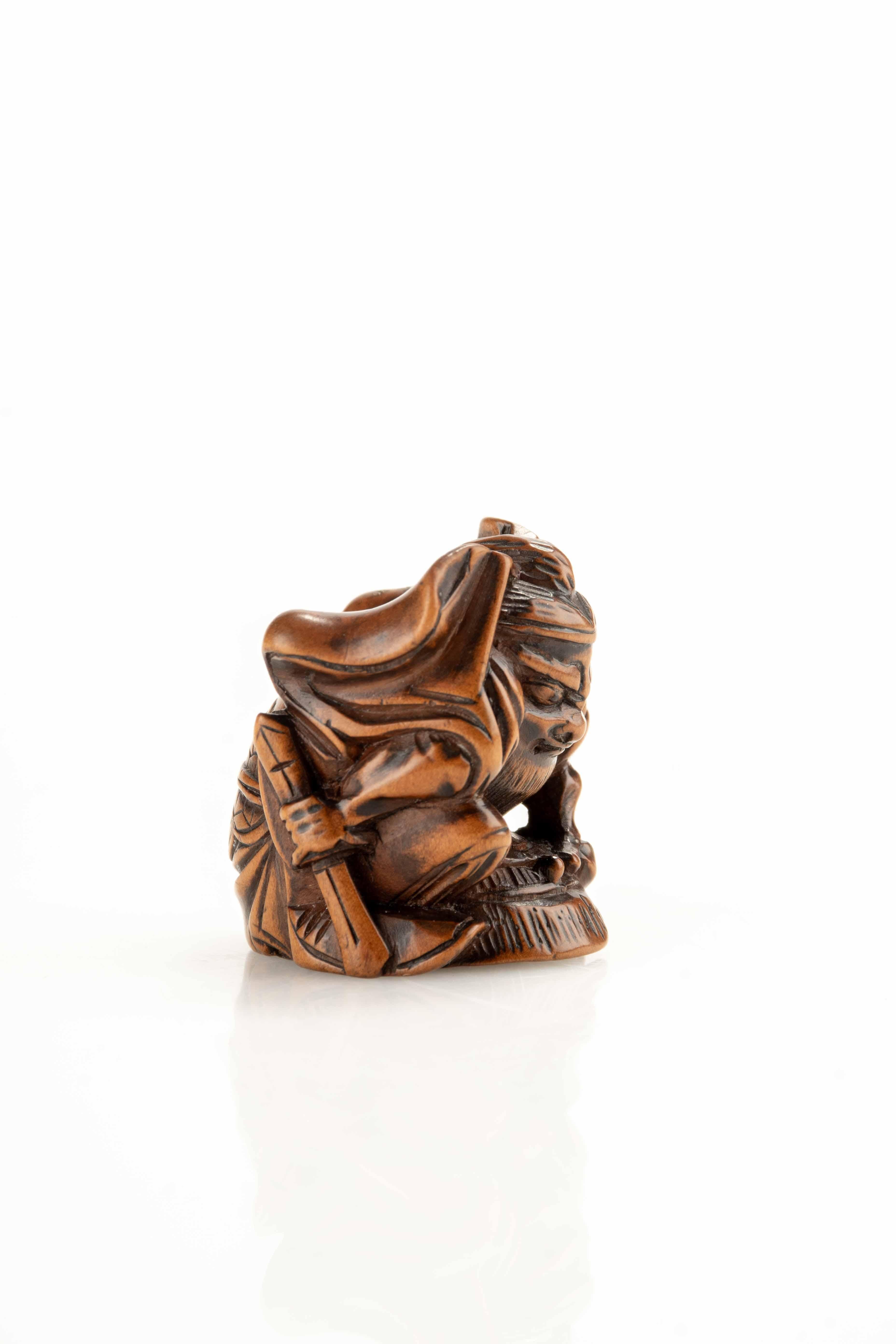 19th Century Netsuke en buis de Shoki avec un Oni en vente
