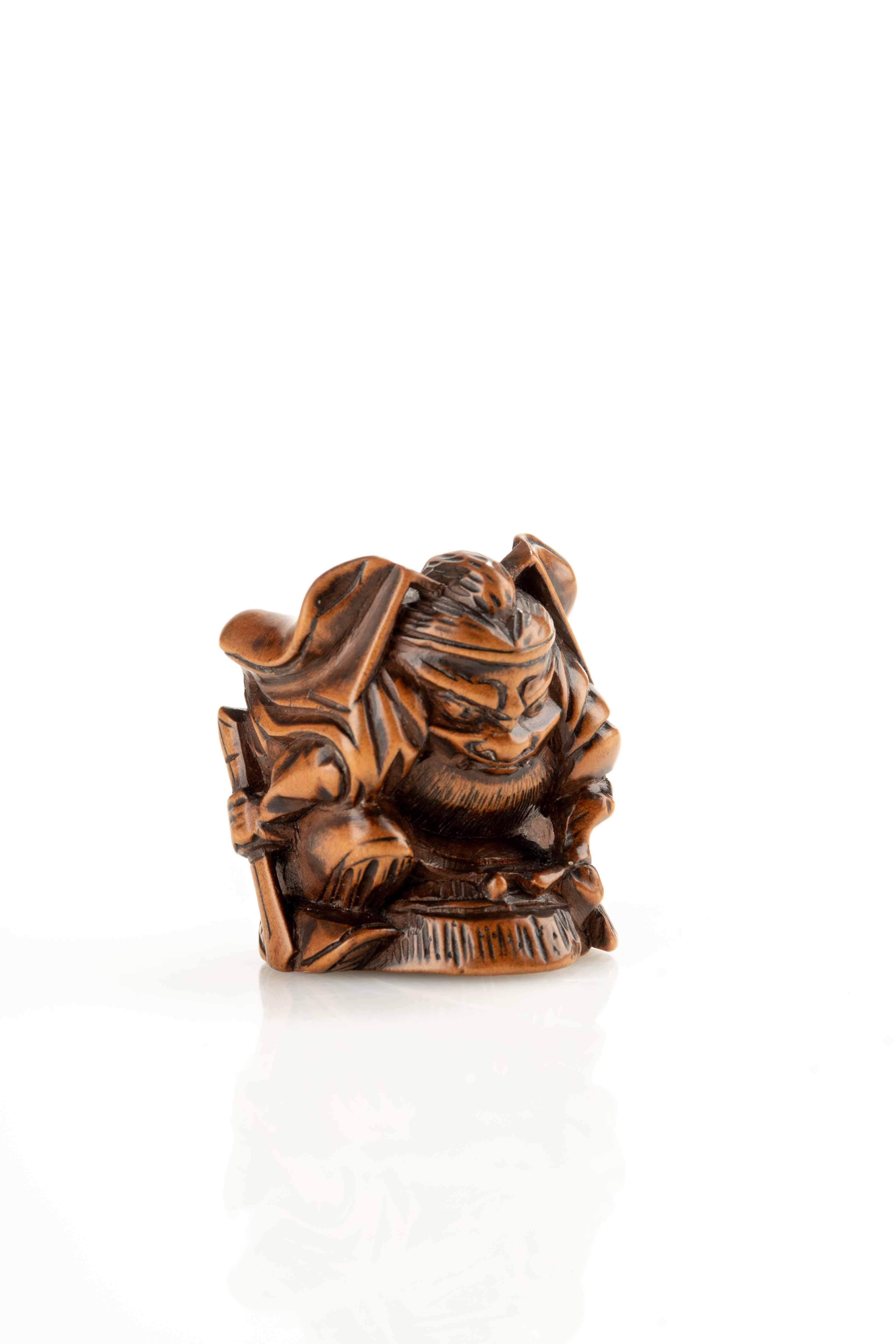 Buis Netsuke en buis de Shoki avec un Oni en vente