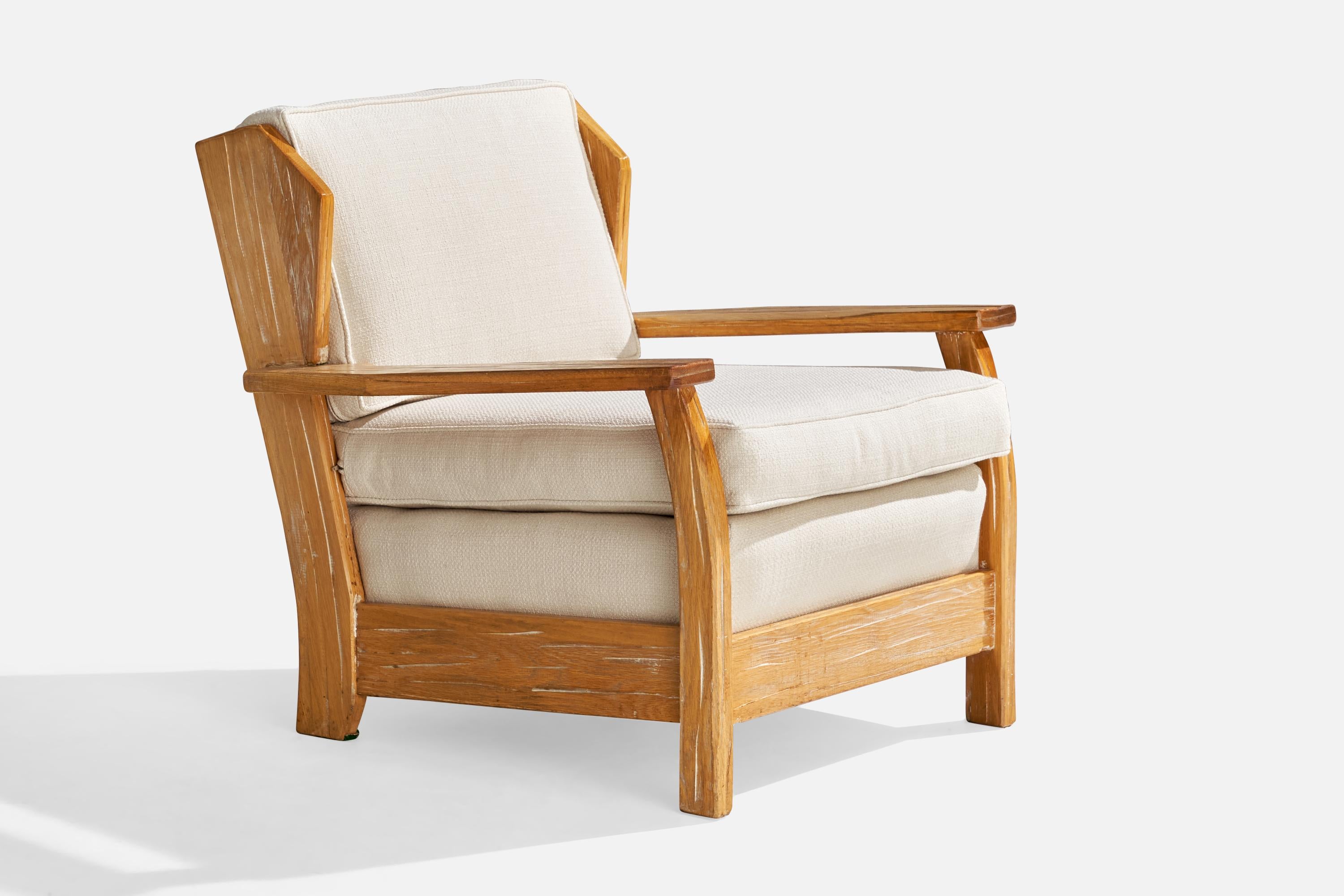 A cerused oak and off-white fabric lounge chair designed and produced by A. Brandt Ranch Oak, USA, c. 1950s.

Seat height: 18“

All upholstered furniture can be reupholstered upon request for an additional fee. Lead times will be an additional 1-3
