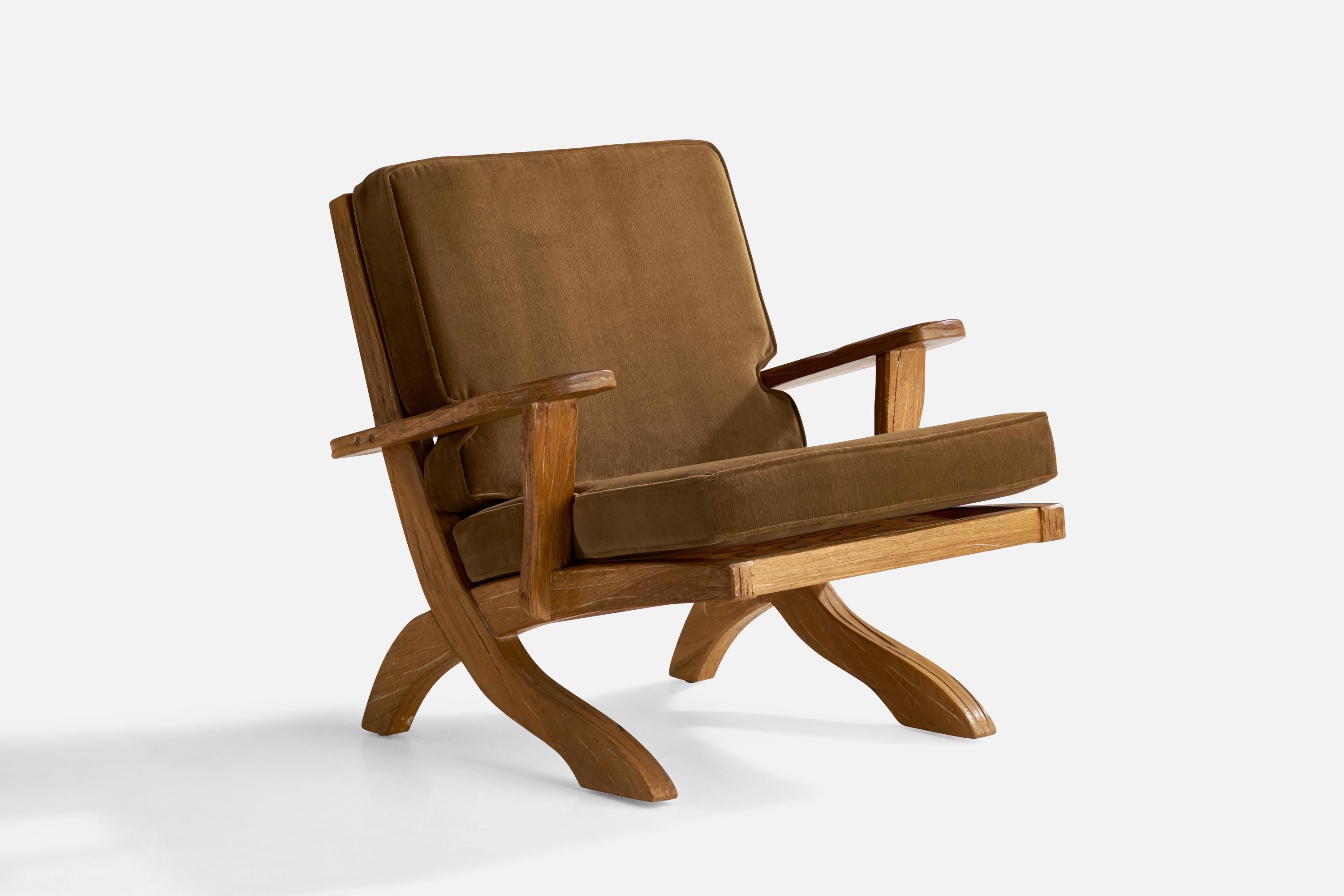 An oak and brown velvet lounge chair designed and produced by A. Brandt Ranch Oak, USA, 1950s.

Seat height: 17.75