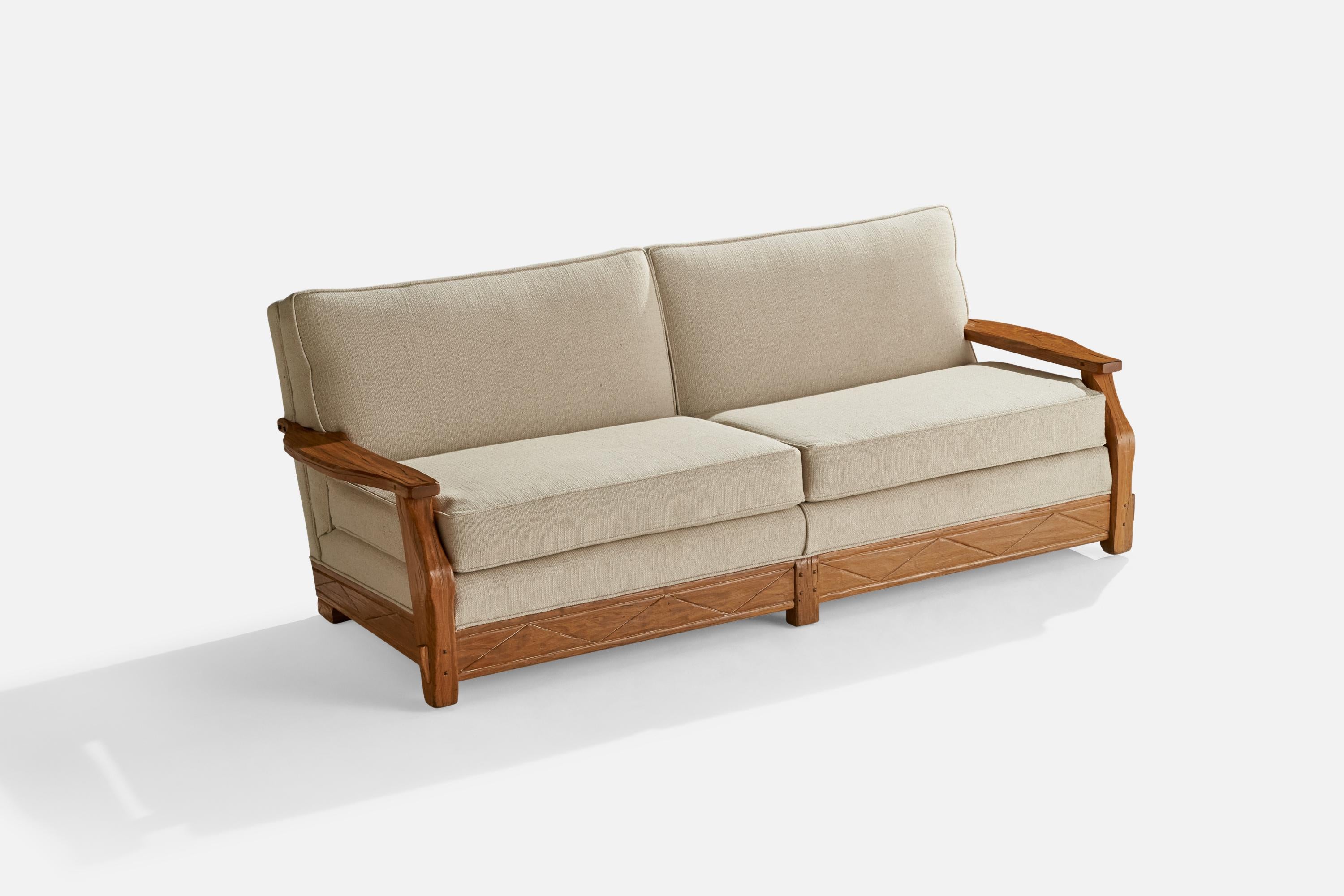 An oak and off-white fabric sofa designed and produced by A. Brandt Ranch Oak, USA, c. 1950s.

Seat height 18”.