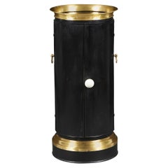 A Brass And Black Metal Bedside Cabinet
