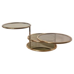 Mesa de centro "anillos" de latón y cristal ahumado, attr. Baughman, hacia 1970