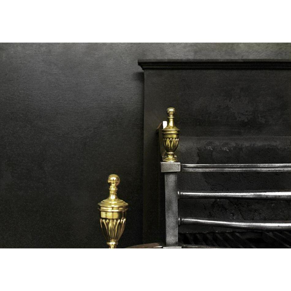 A 19th century cast iron fire basket. The tapering cylindrical legs with classical brass finial above. The shaped fluted brass fret with bowed cast iron front bars above with matching finials. English. 

Additional information:
Width at Front: 710