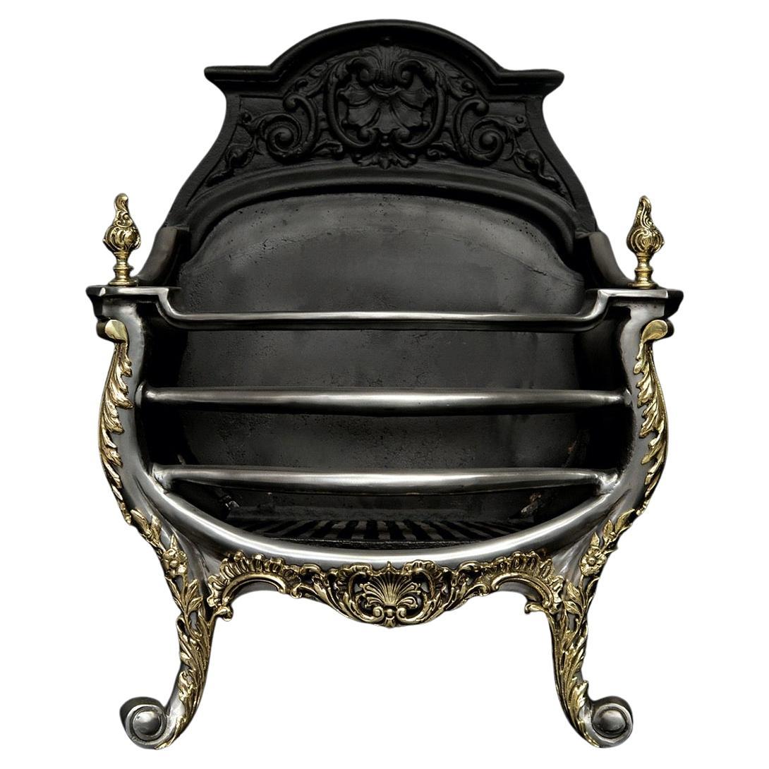 Une grille à feu en laiton et en acier