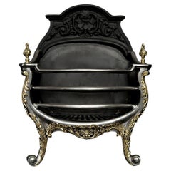 Une grille à feu en laiton et en acier